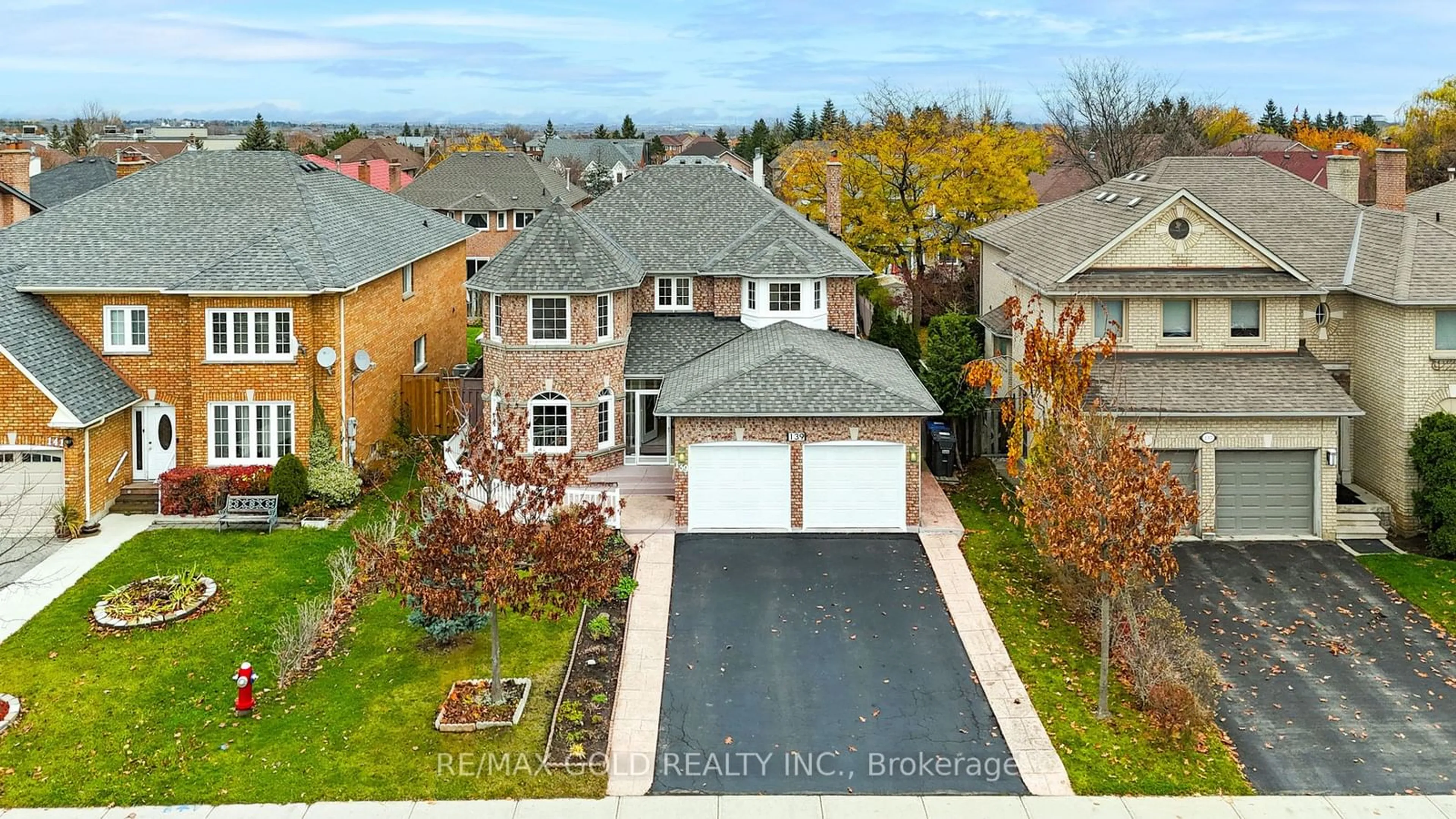 Frontside or backside of a home, the fenced backyard for 139 Mountainash Rd, Brampton Ontario L6R 1J1