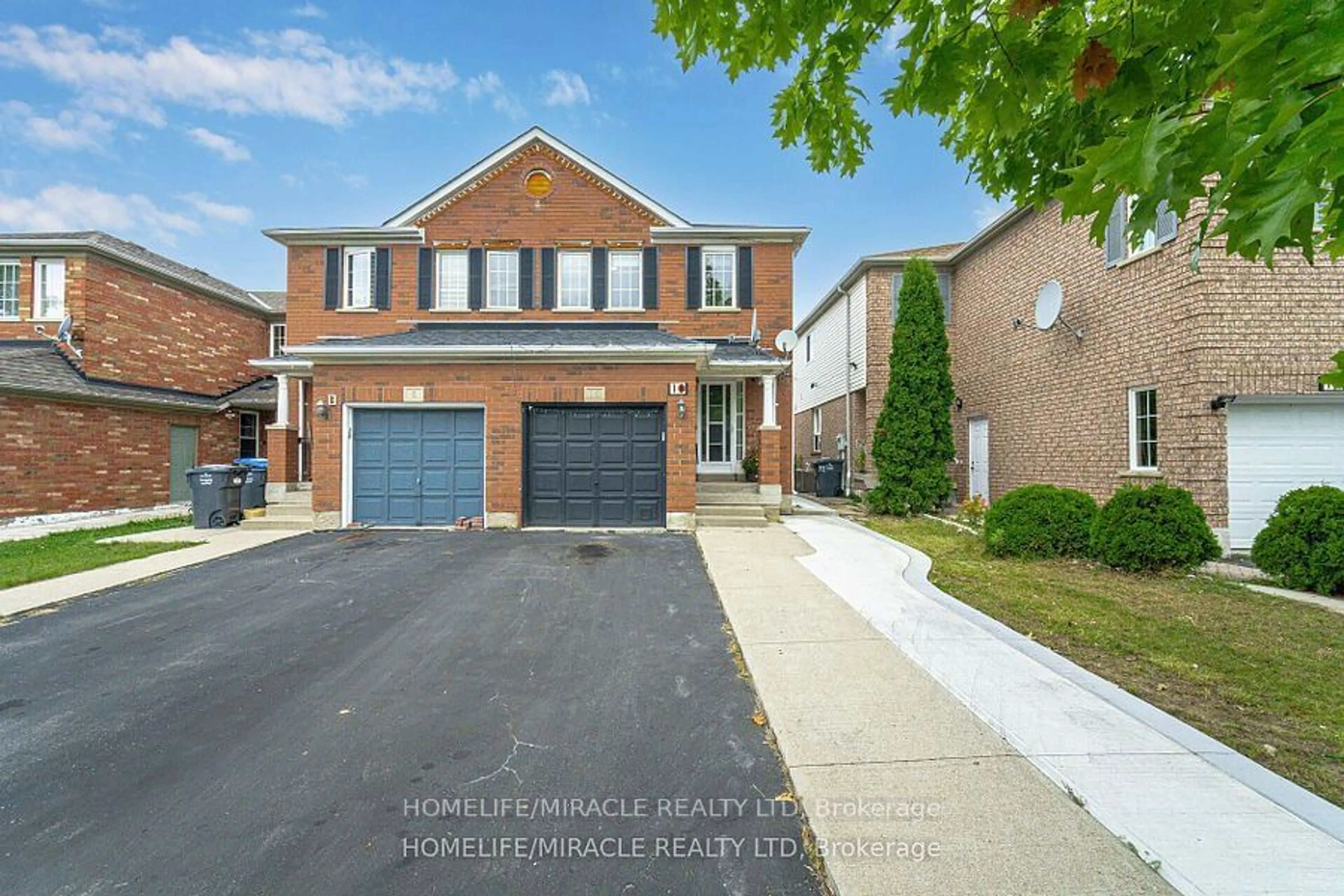 Home with brick exterior material for 10 Hackberry Gate, Brampton Ontario L6R 2E7