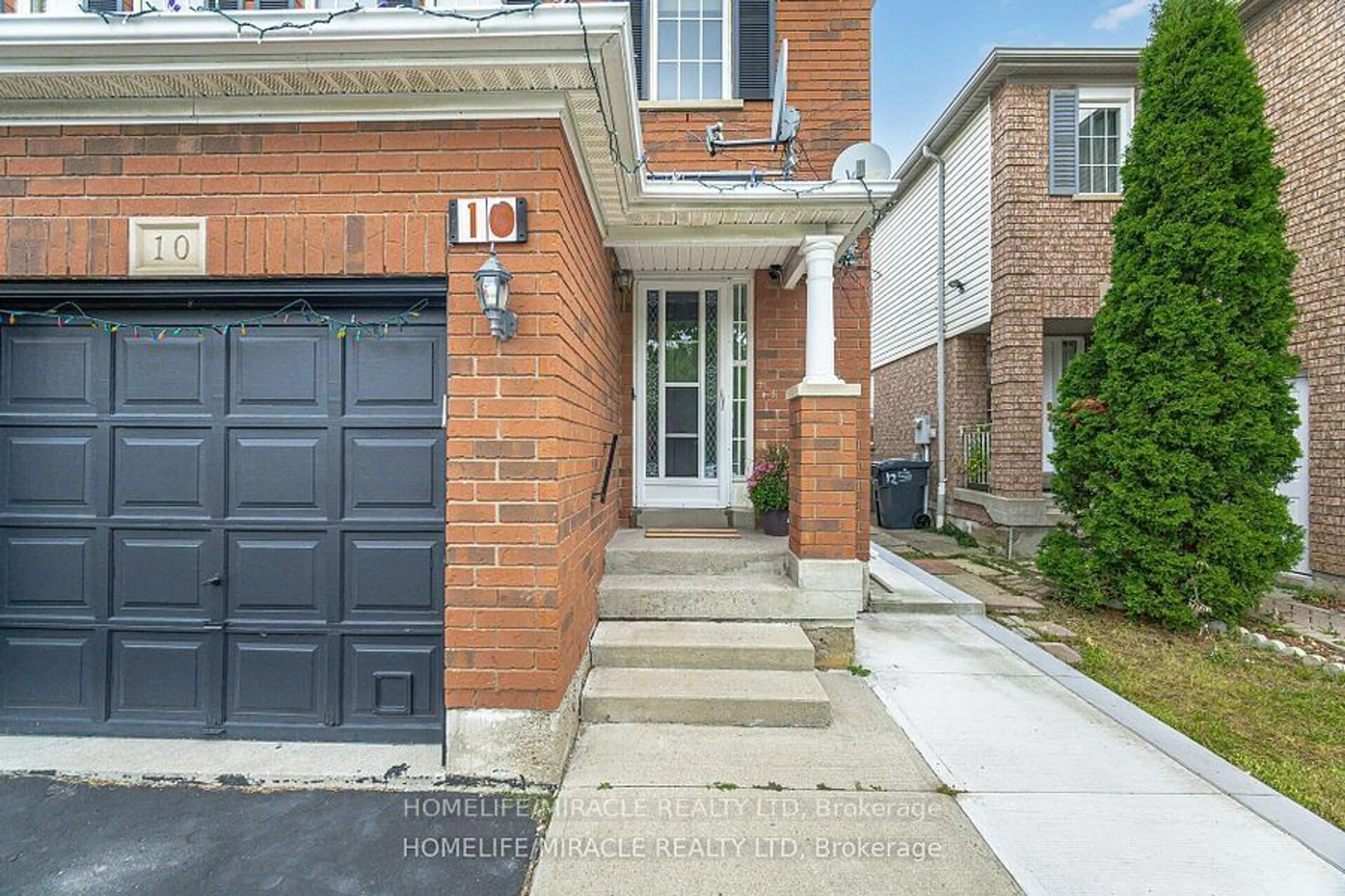 Home with brick exterior material for 10 Hackberry Gate, Brampton Ontario L6R 2E7