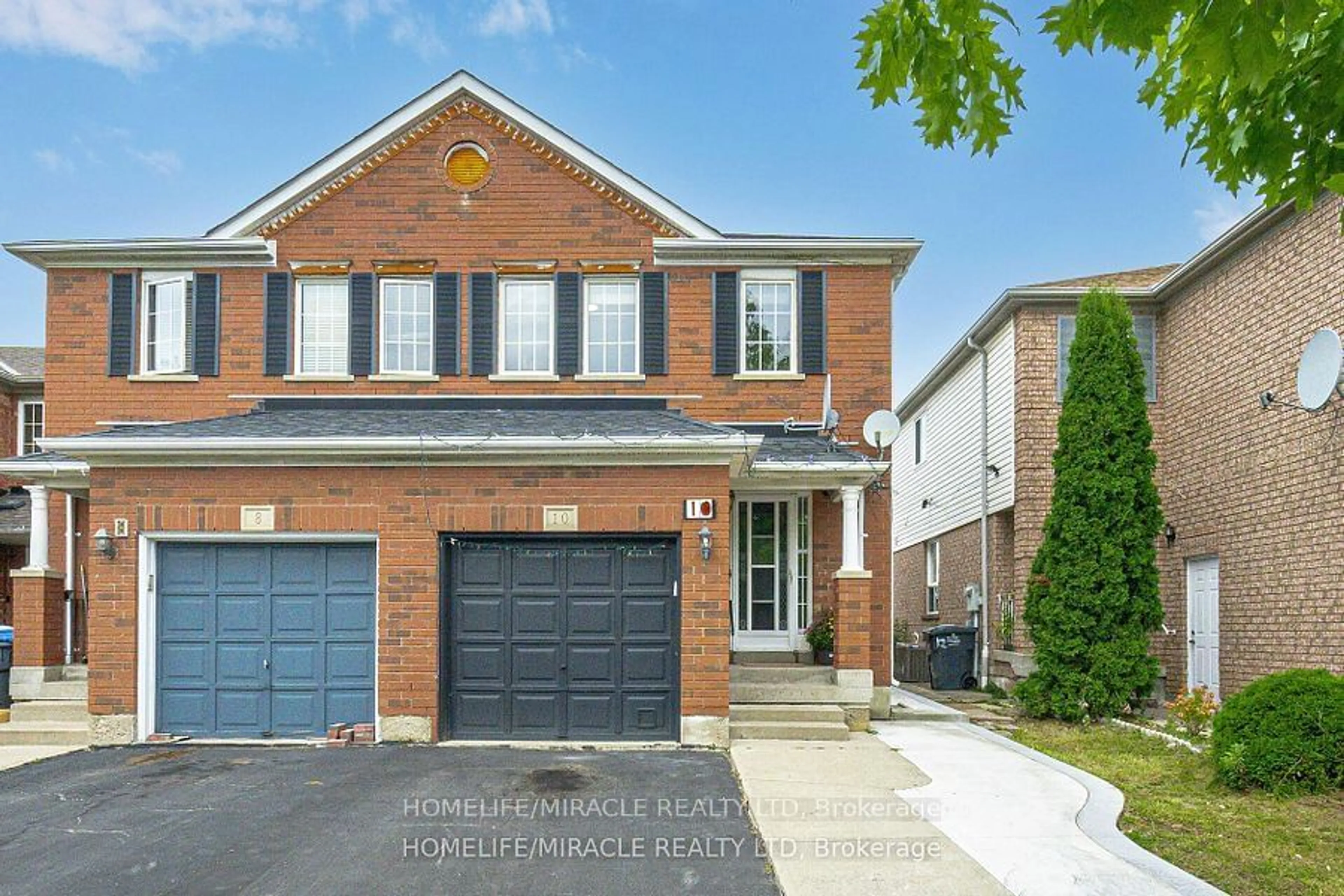 Home with brick exterior material for 10 Hackberry Gate, Brampton Ontario L6R 2E7