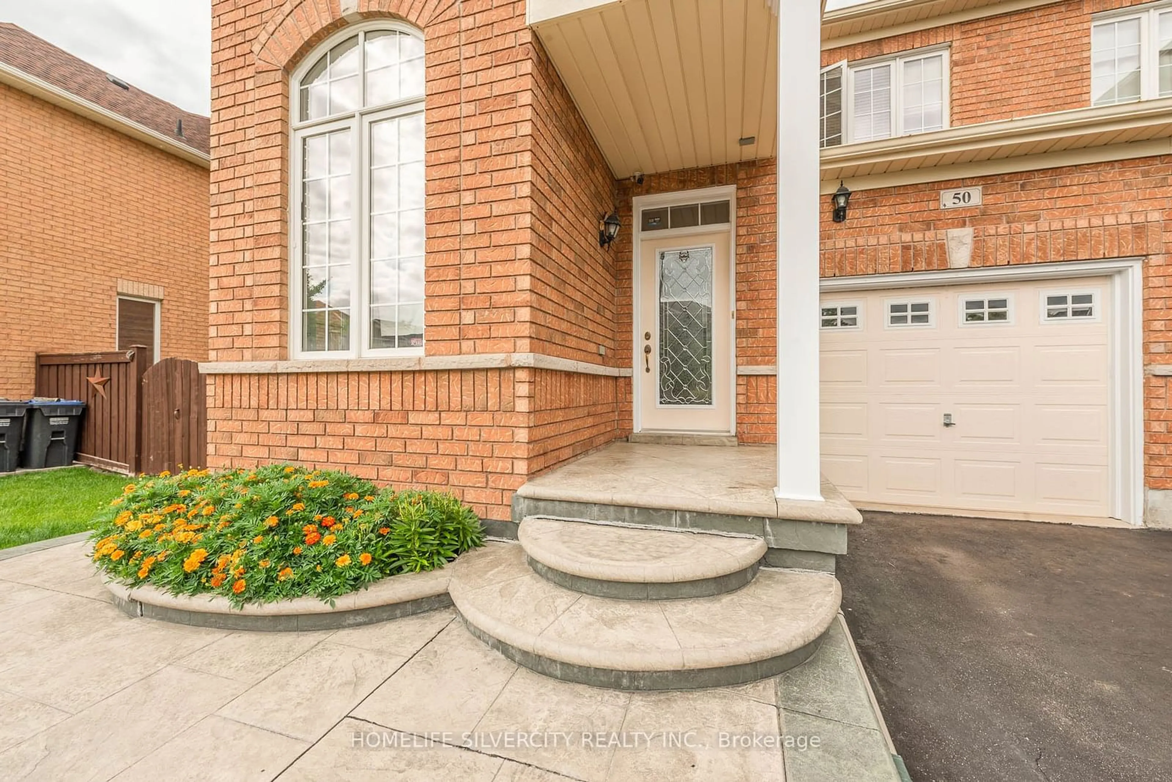 Home with brick exterior material for 50 Begonia Cres, Brampton Ontario L7A 0M6