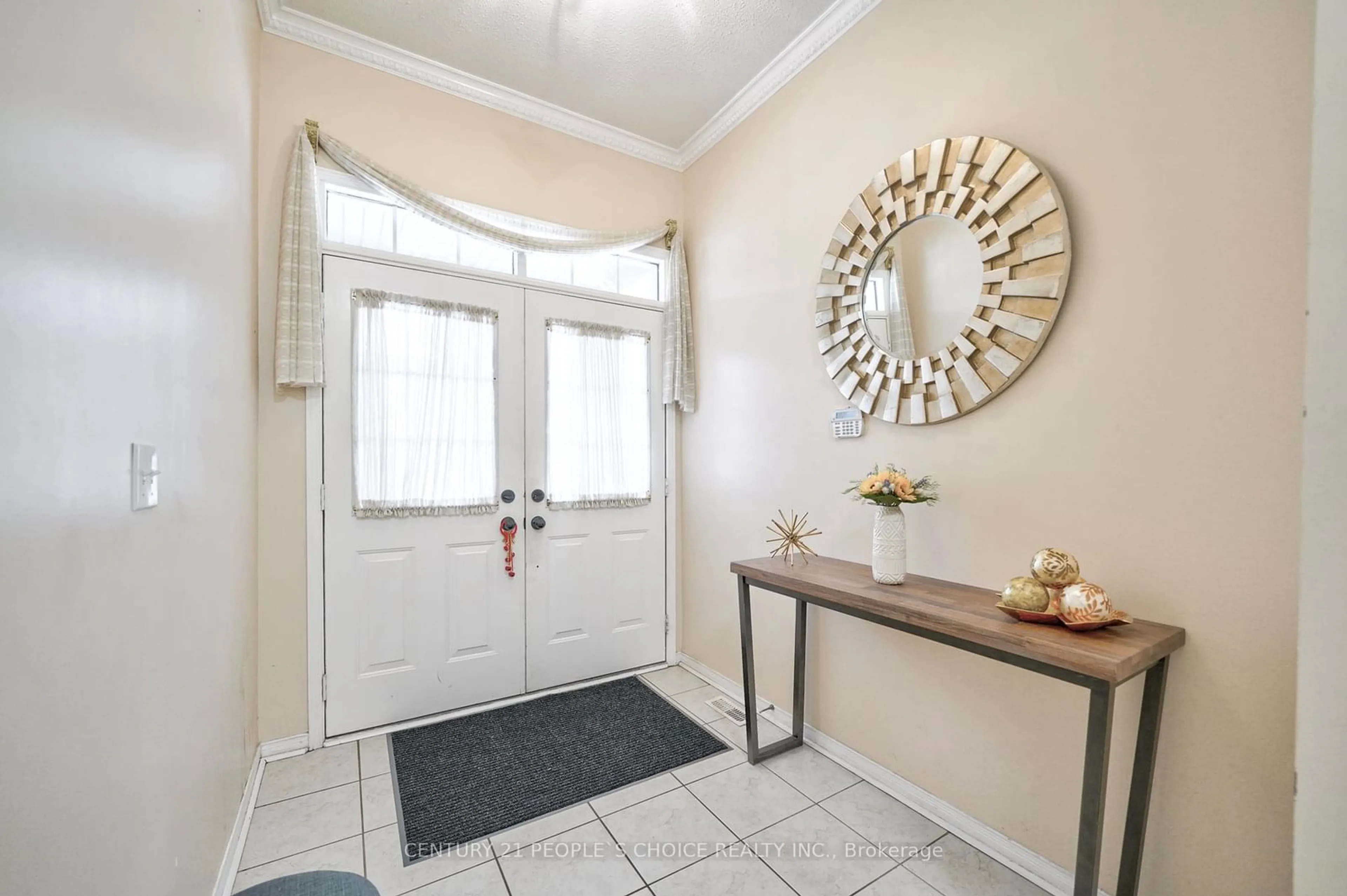 Indoor entryway, wood floors for 42 Pennyroyal Cres, Brampton Ontario L6S 6J7