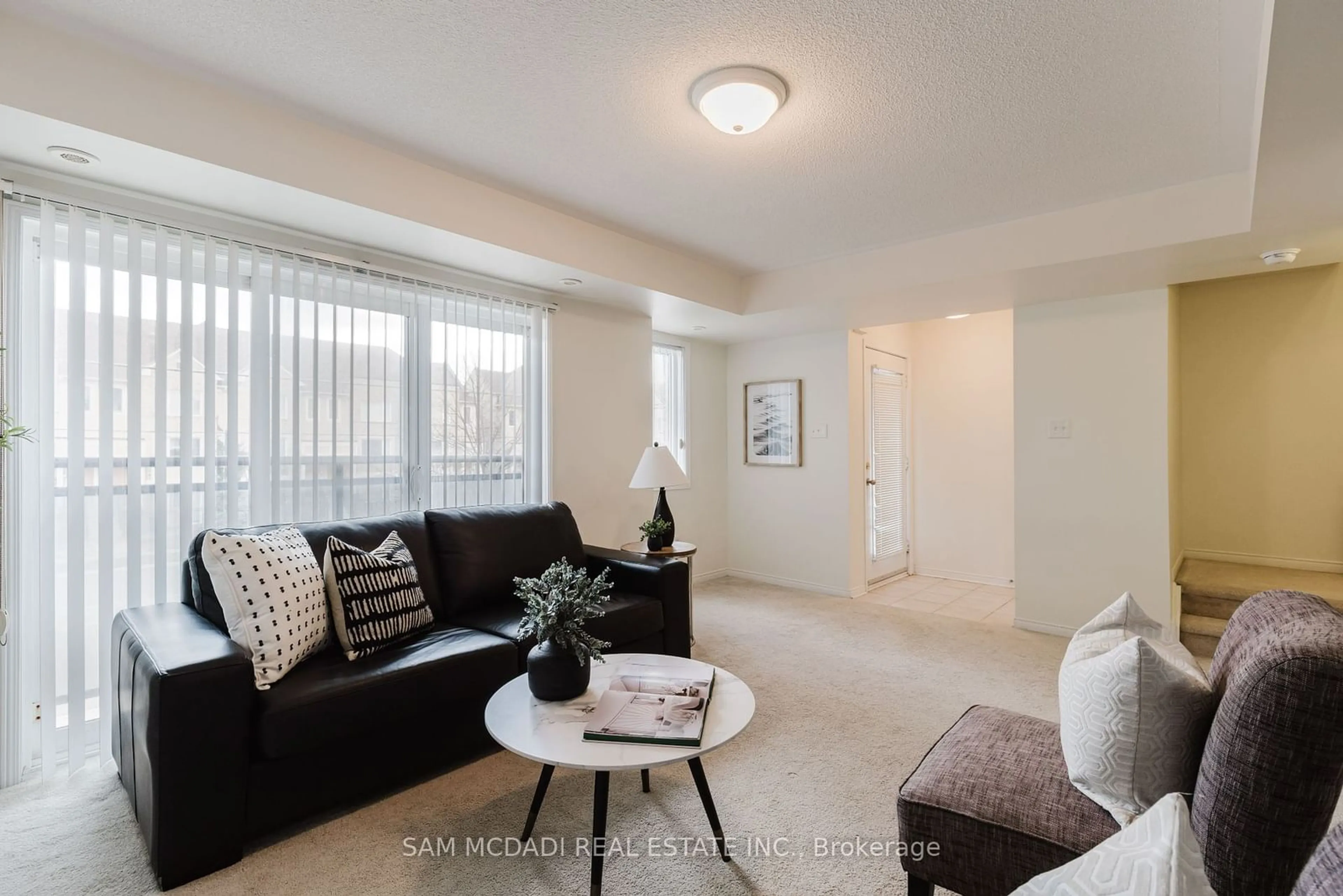 Living room, carpet floors for 5035 Oscar Peterson Blvd #109, Mississauga Ontario L5M 0P4