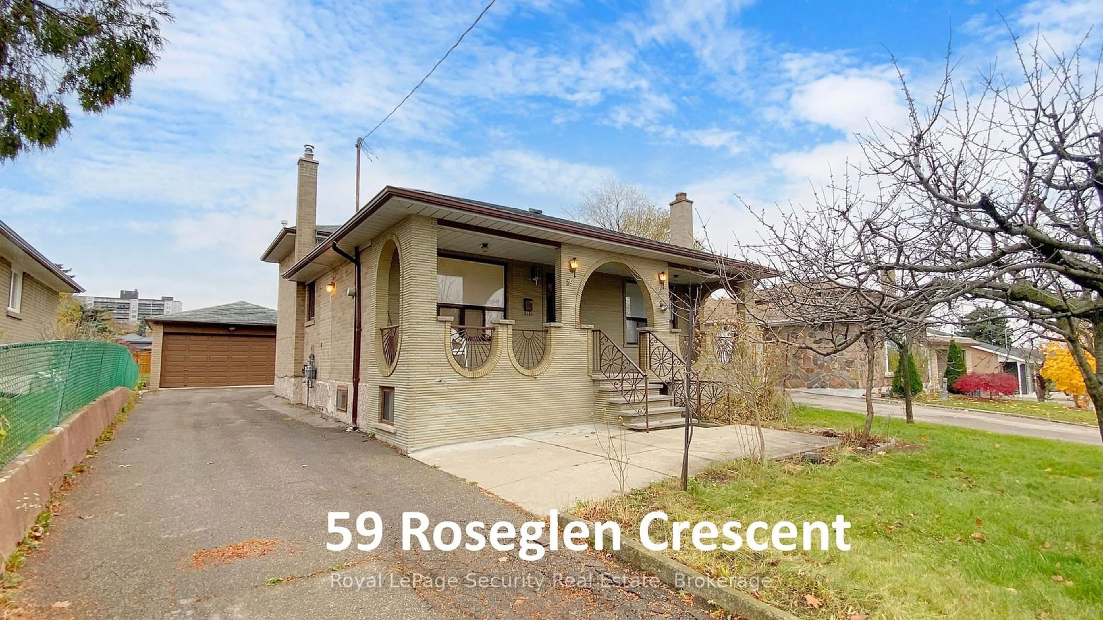 Frontside or backside of a home, the front or back of building for 59 Roseglen Cres, Toronto Ontario M3N 1G7