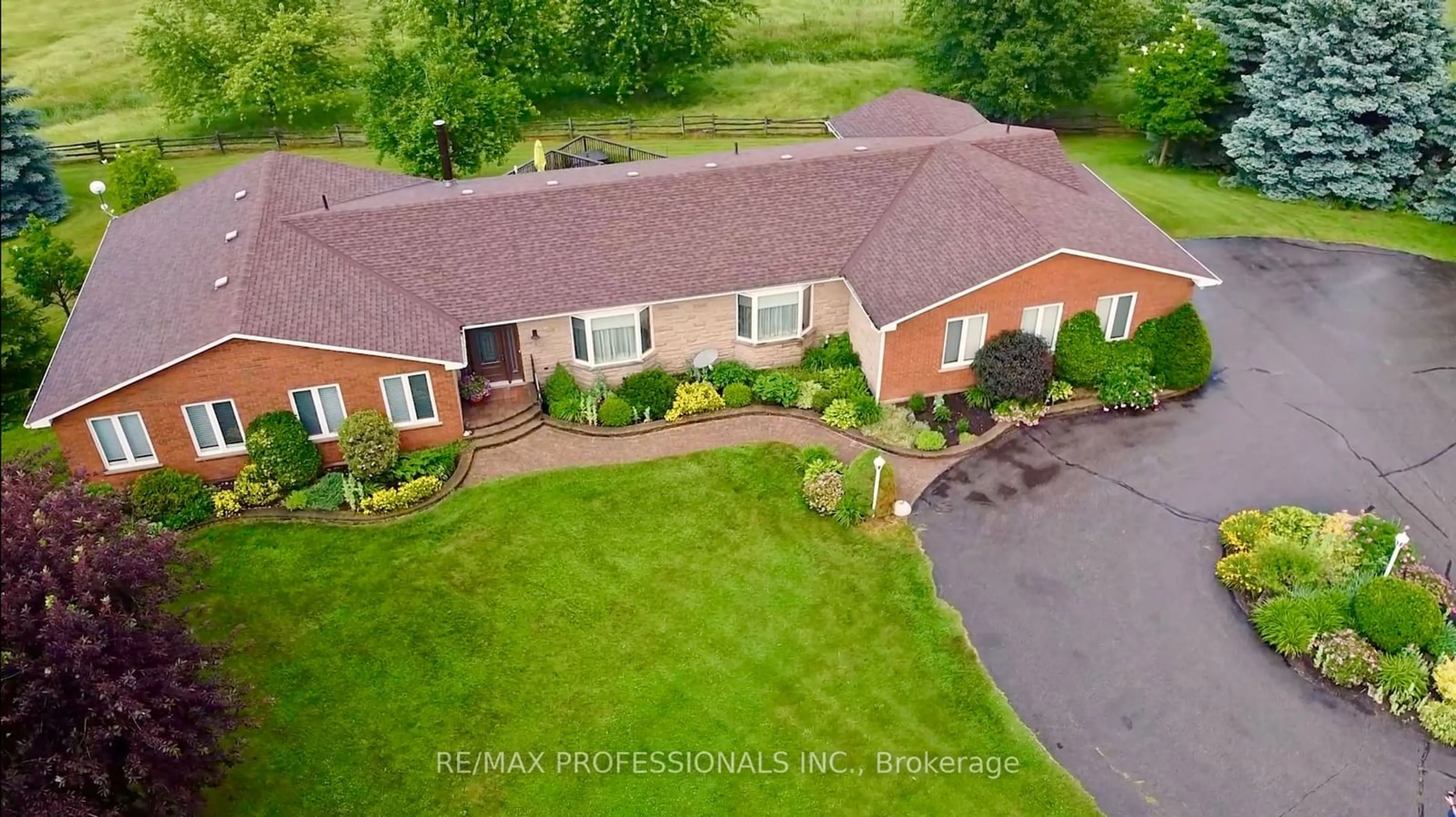 Frontside or backside of a home, the fenced backyard for 12731 Dixie Rd, Caledon Ontario L7C 2M5