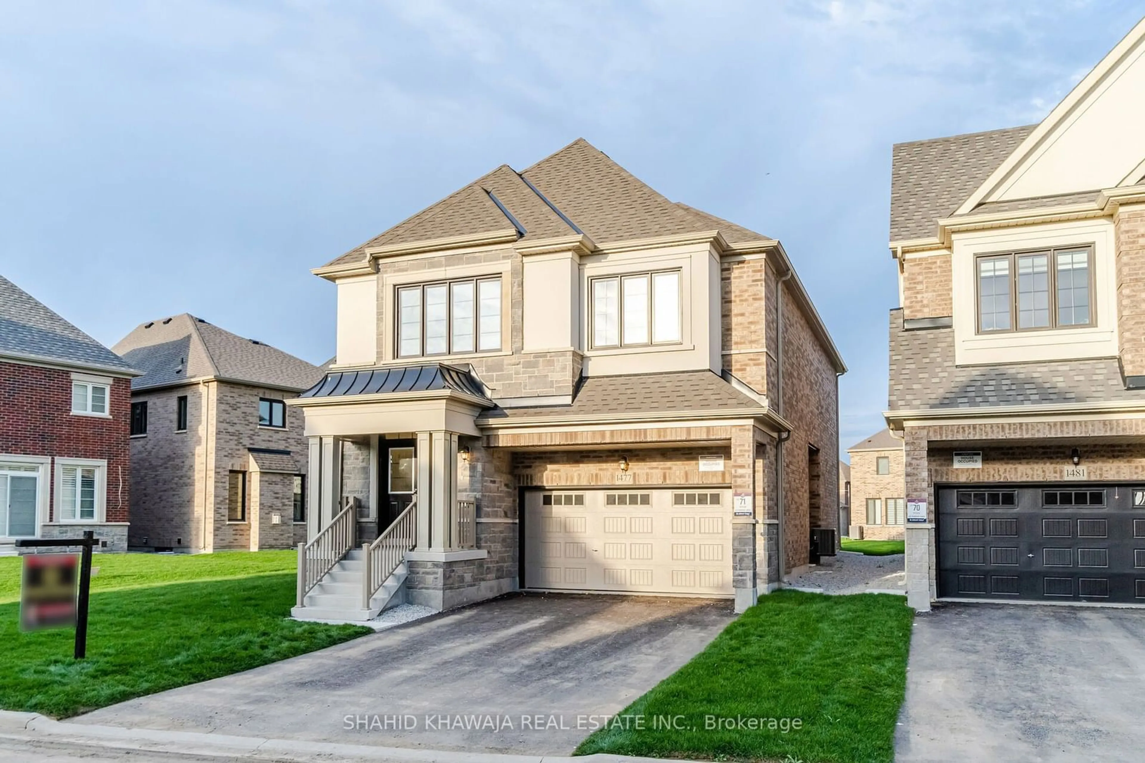 Frontside or backside of a home, the street view for 1477 Strawberry Landing, Milton Ontario L9E 1Y8