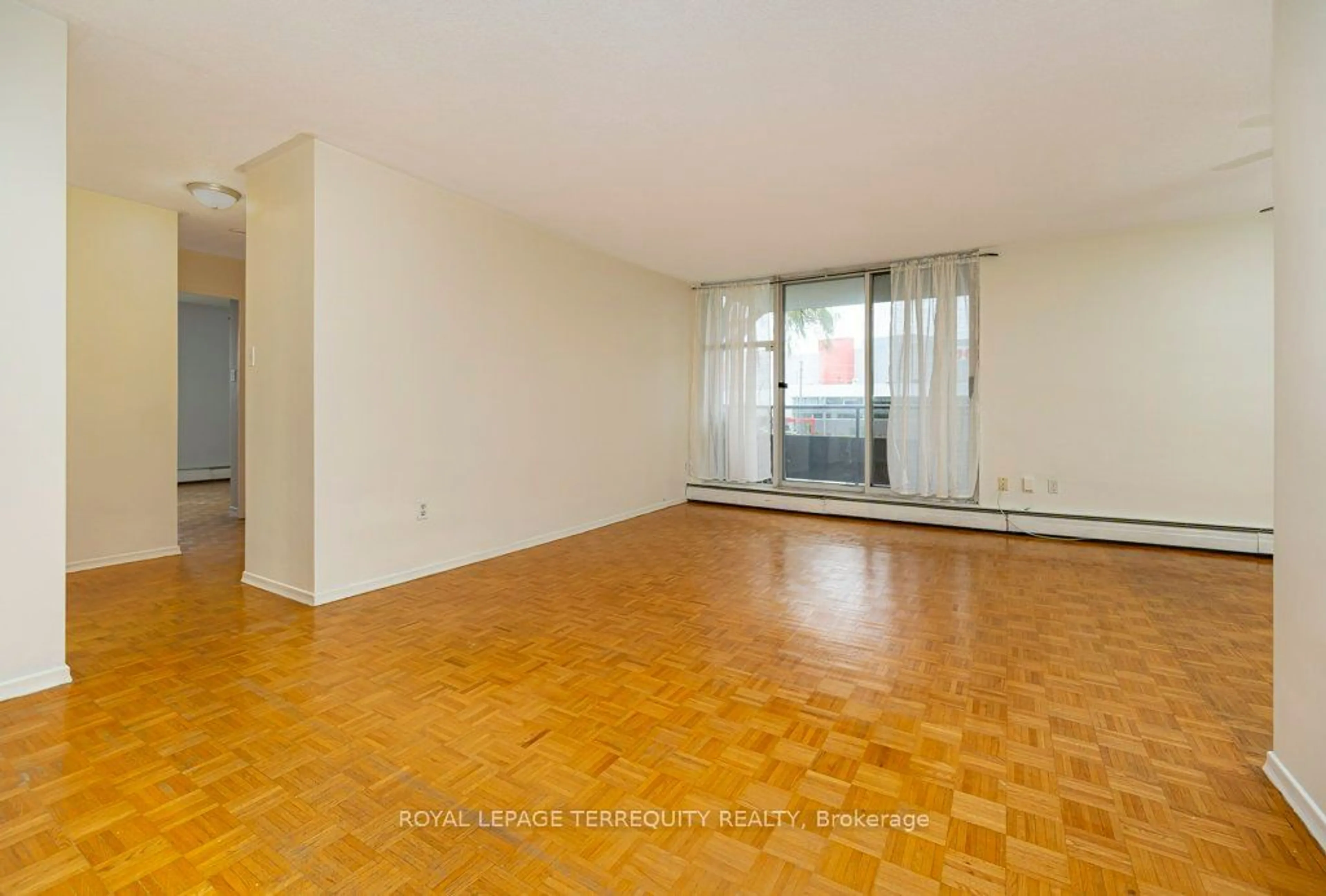 A pic of a room, wood floors for 11 Neilson Dr #201, Toronto Ontario M9C 1V4