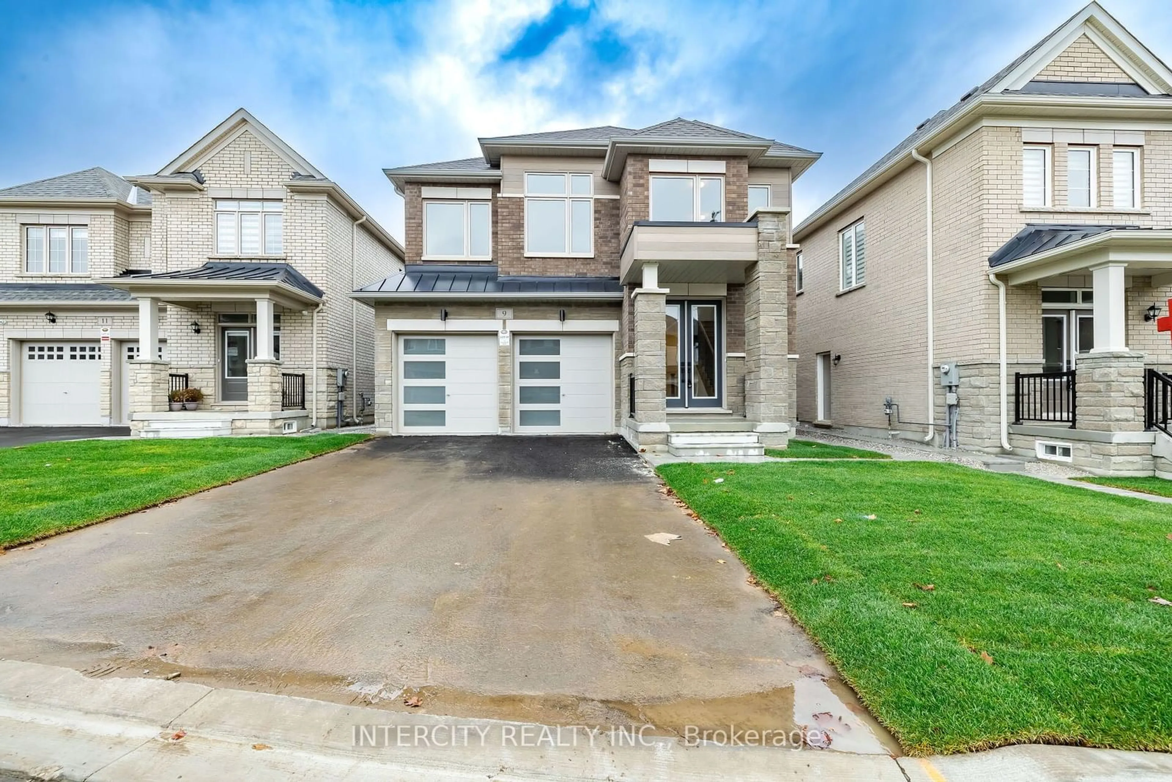 Frontside or backside of a home, the street view for 9 Dolomite Dr, Brampton Ontario L6P 4R6