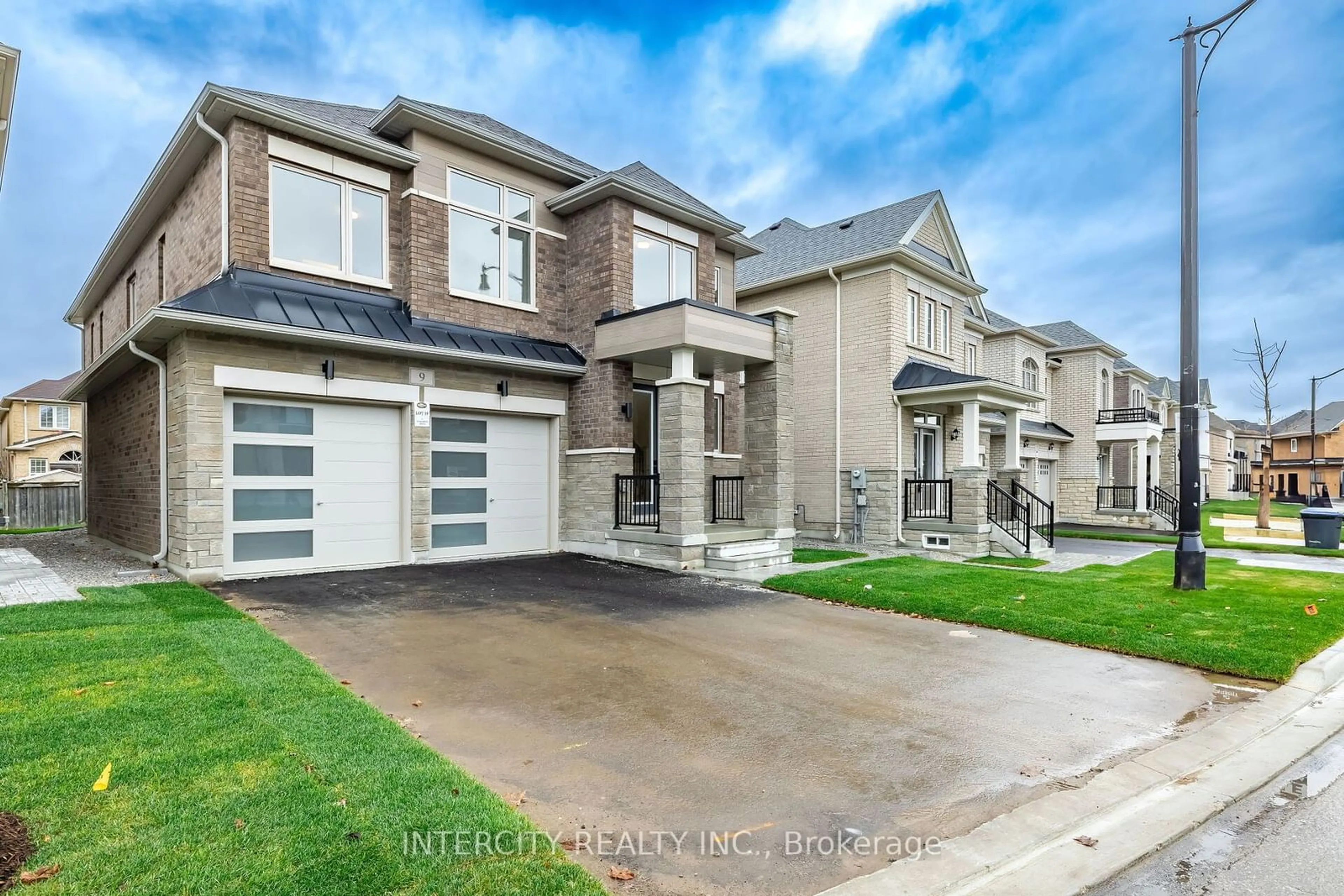 Frontside or backside of a home, the street view for 9 Dolomite Dr, Brampton Ontario L6P 4R6