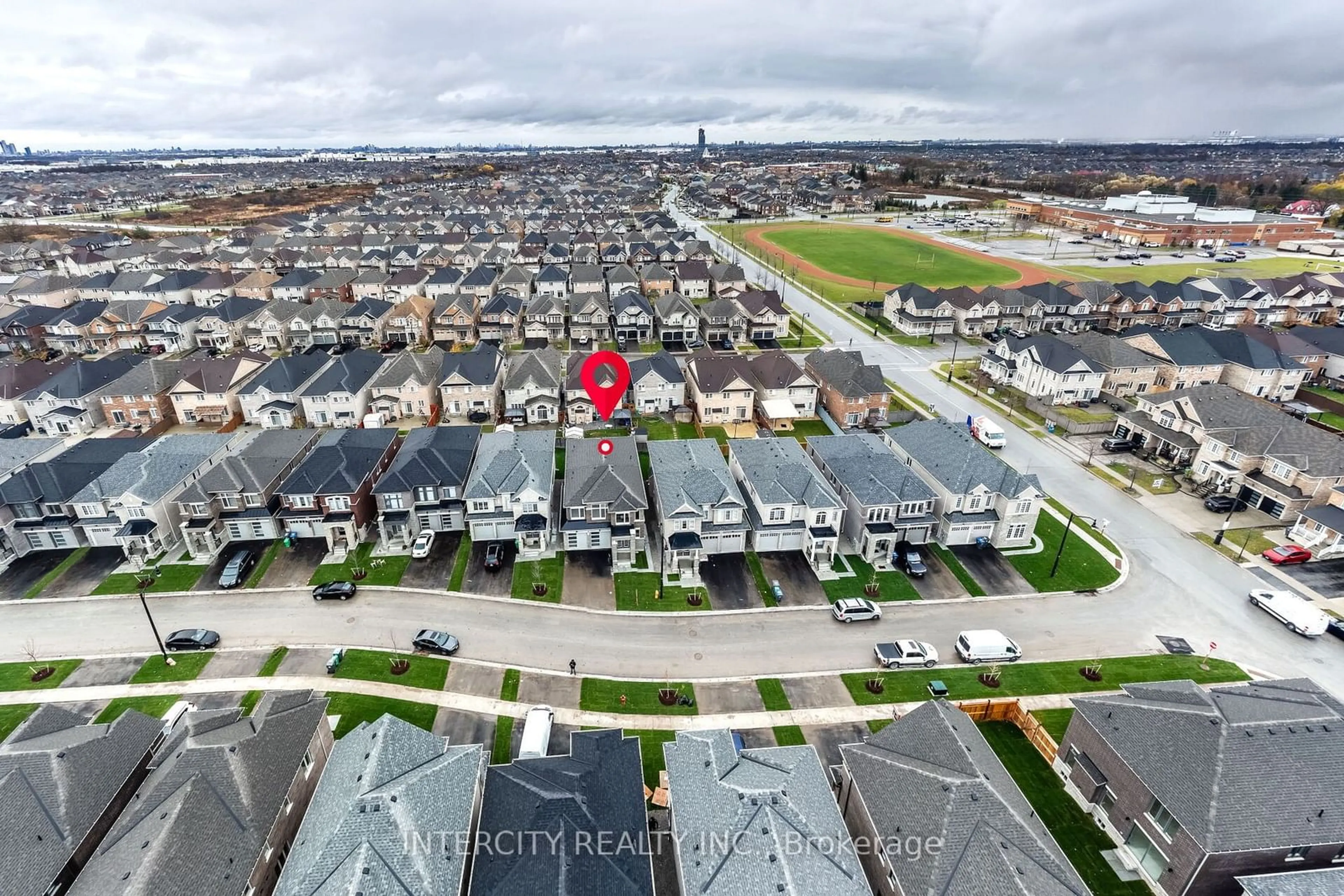 Frontside or backside of a home, the street view for 9 Dolomite Dr, Brampton Ontario L6P 4R6