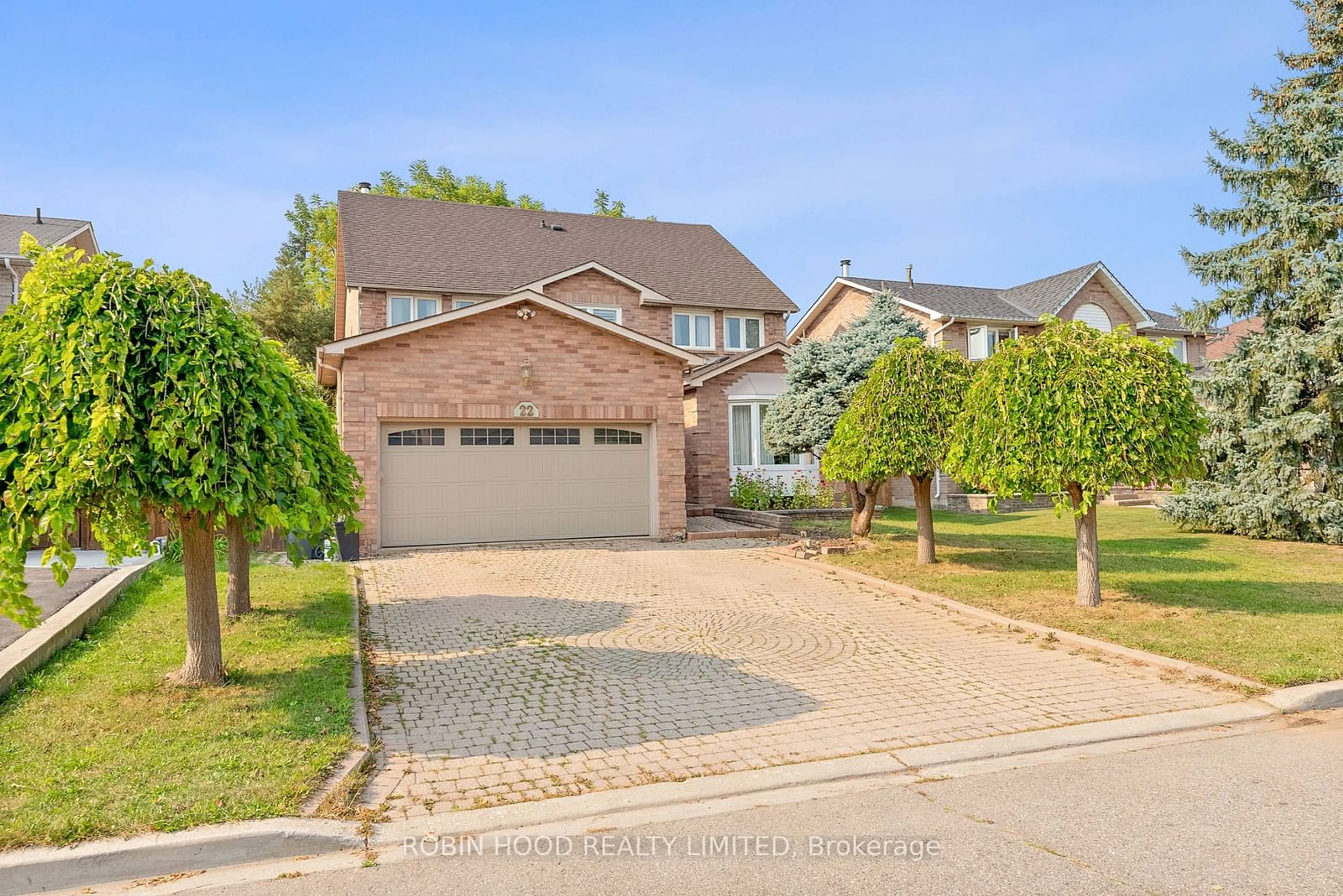 Frontside or backside of a home, the street view for 22 Strangway Crt, Brampton Ontario L6Z 4L4