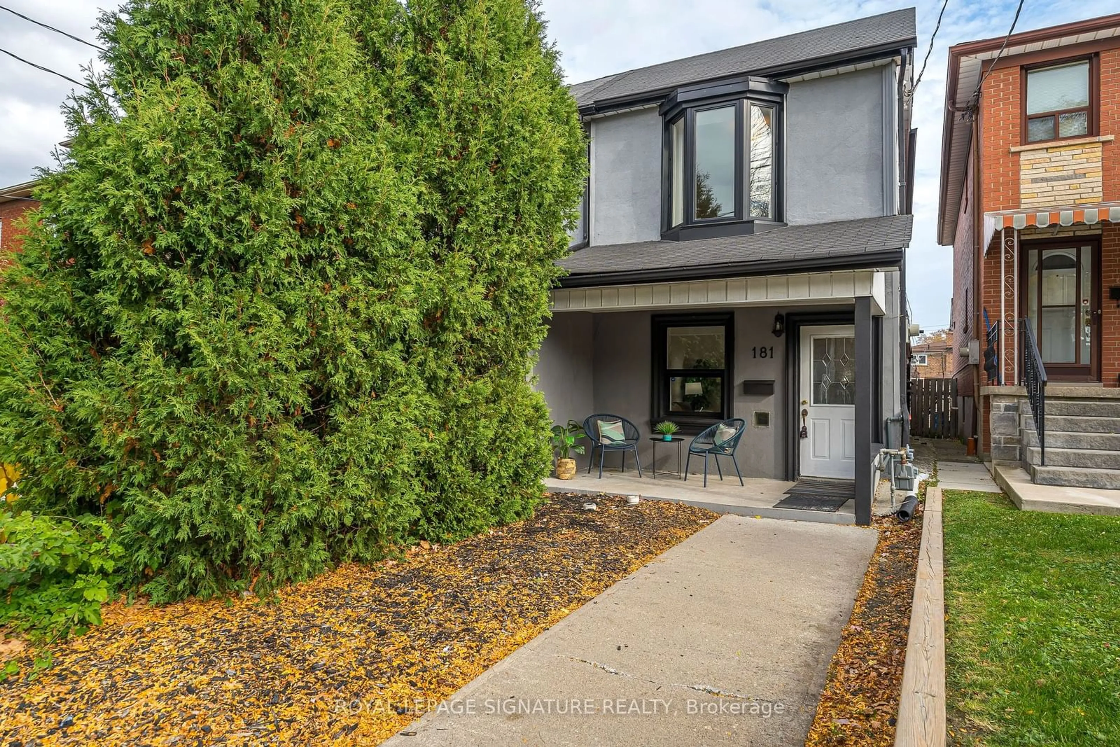 A pic from exterior of the house or condo, the fenced backyard for 181 Earlscourt Ave, Toronto Ontario M6E 2B2