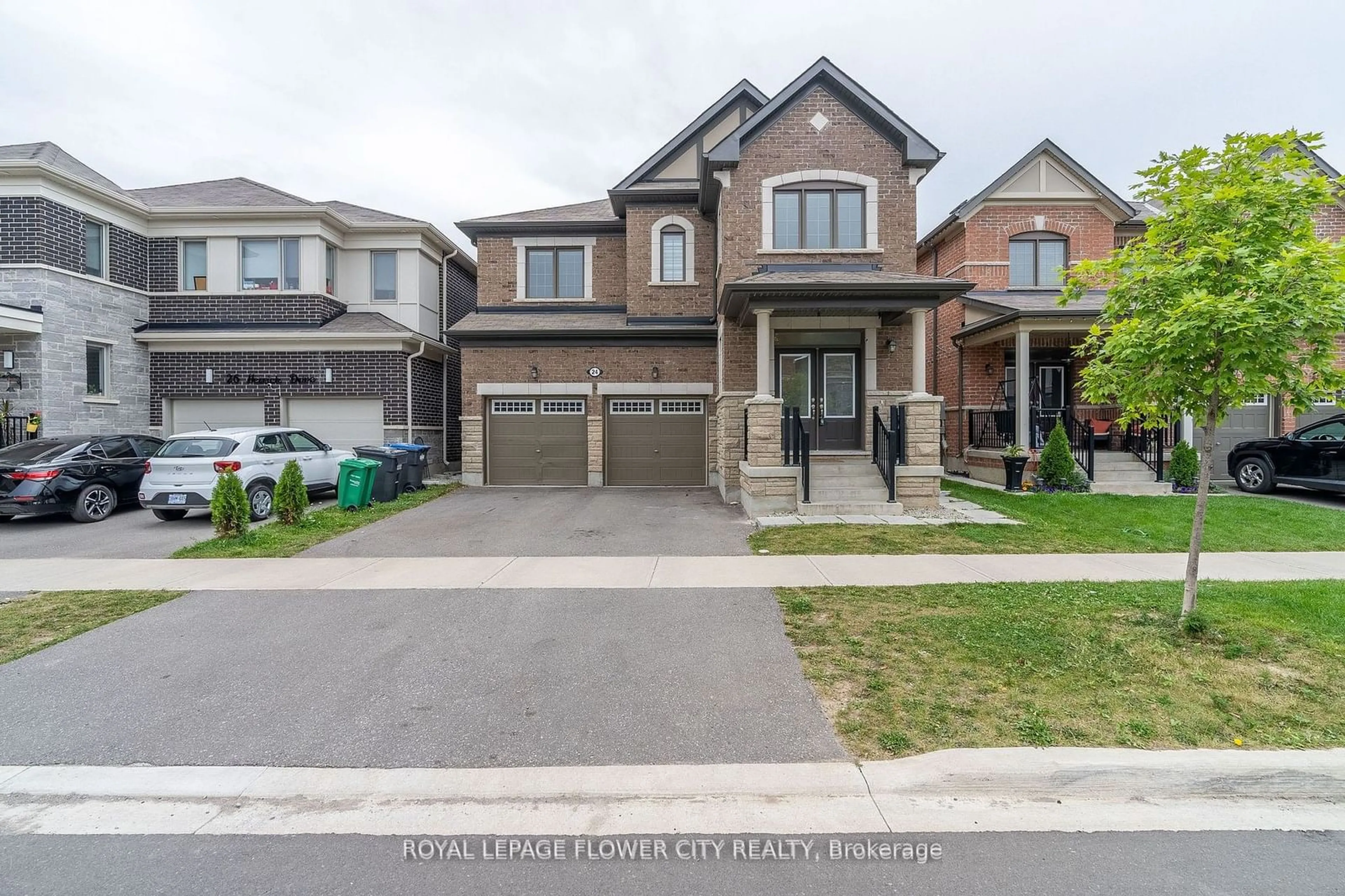 Frontside or backside of a home, the street view for 24 Herrick Dr, Brampton Ontario L7A 5G2