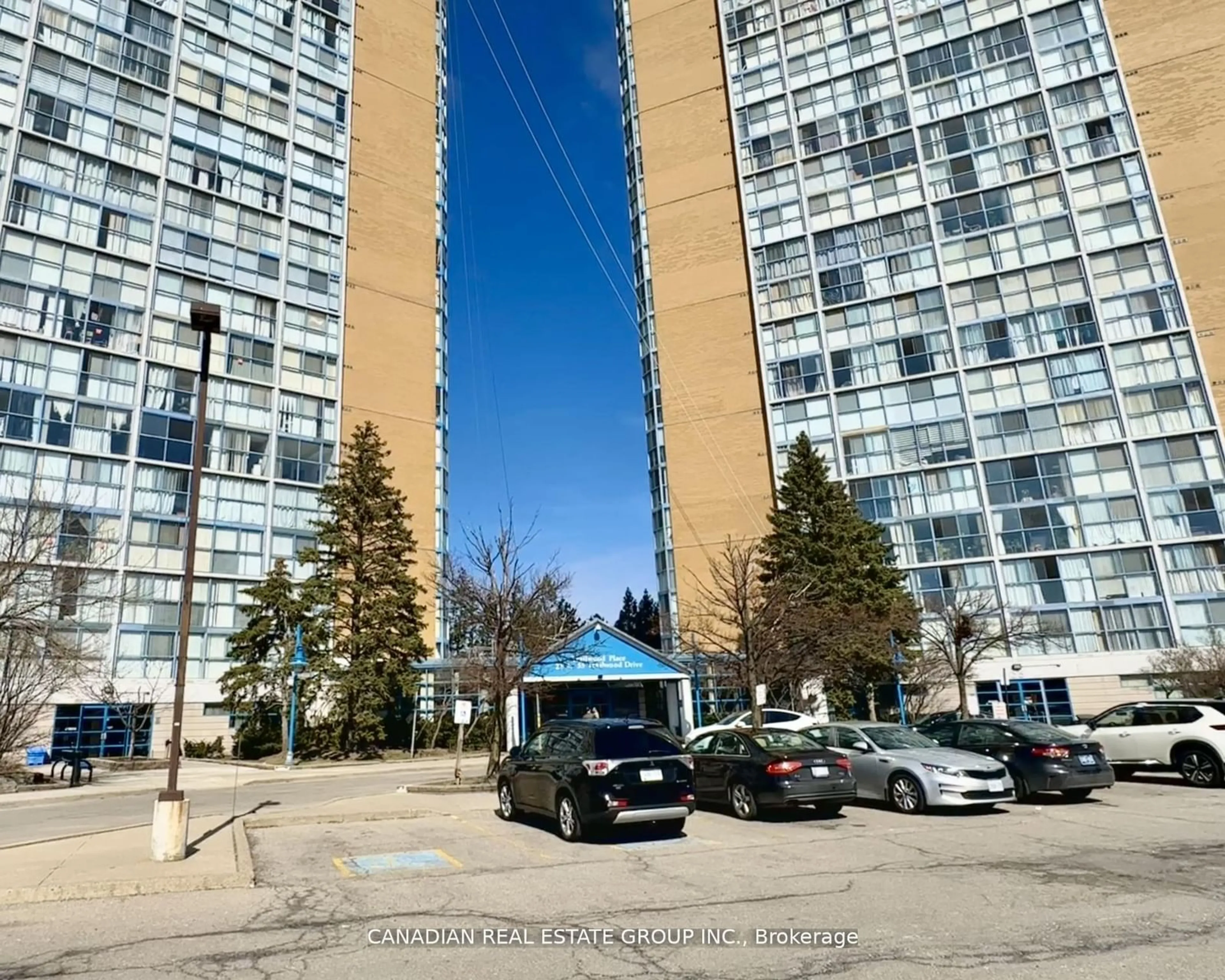 A pic from exterior of the house or condo, the street view for 25 Trailwood Dr #103, Mississauga Ontario L4Z 3K9