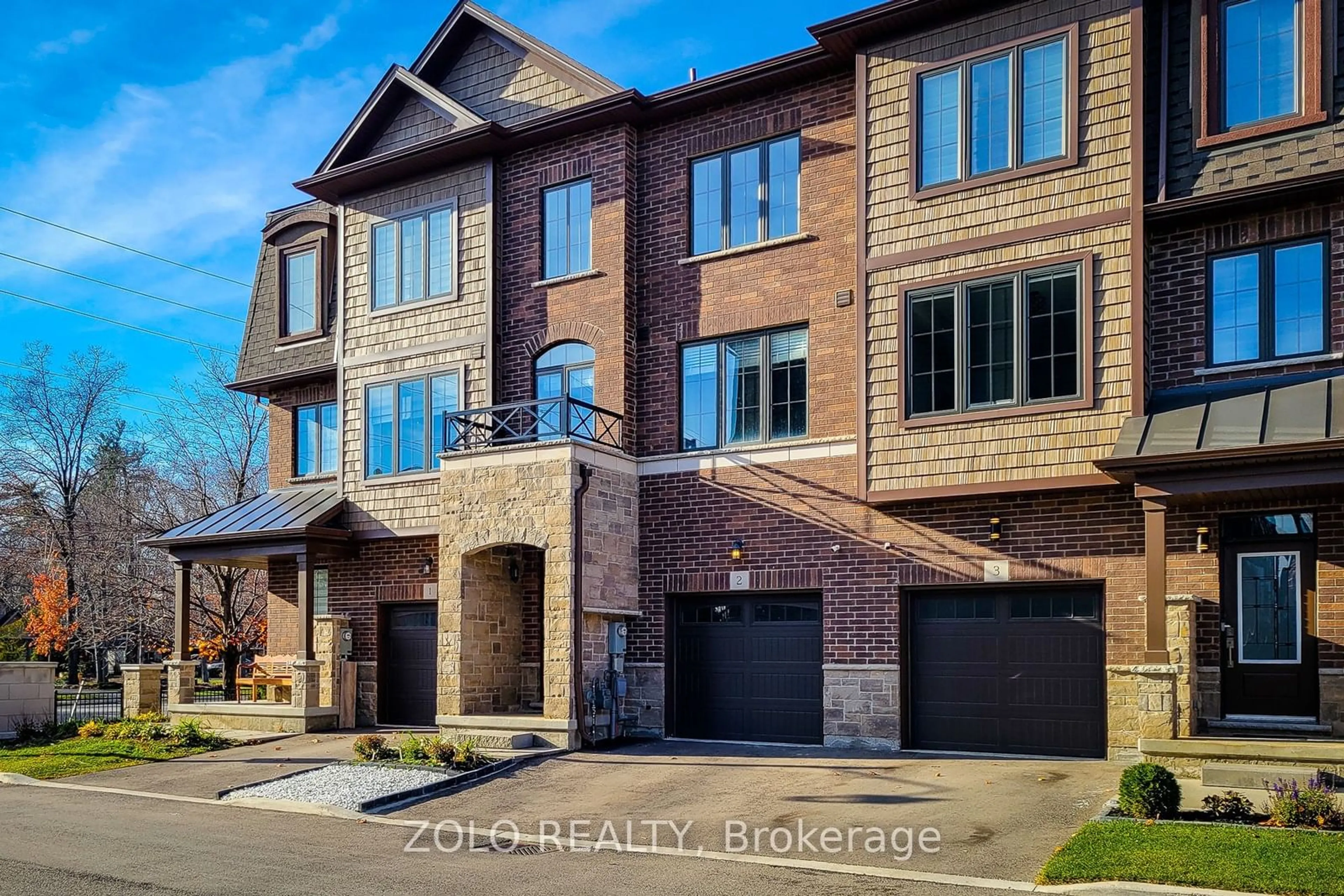 Home with brick exterior material for 445 Ontario St #2, Milton Ontario L9T 9K2