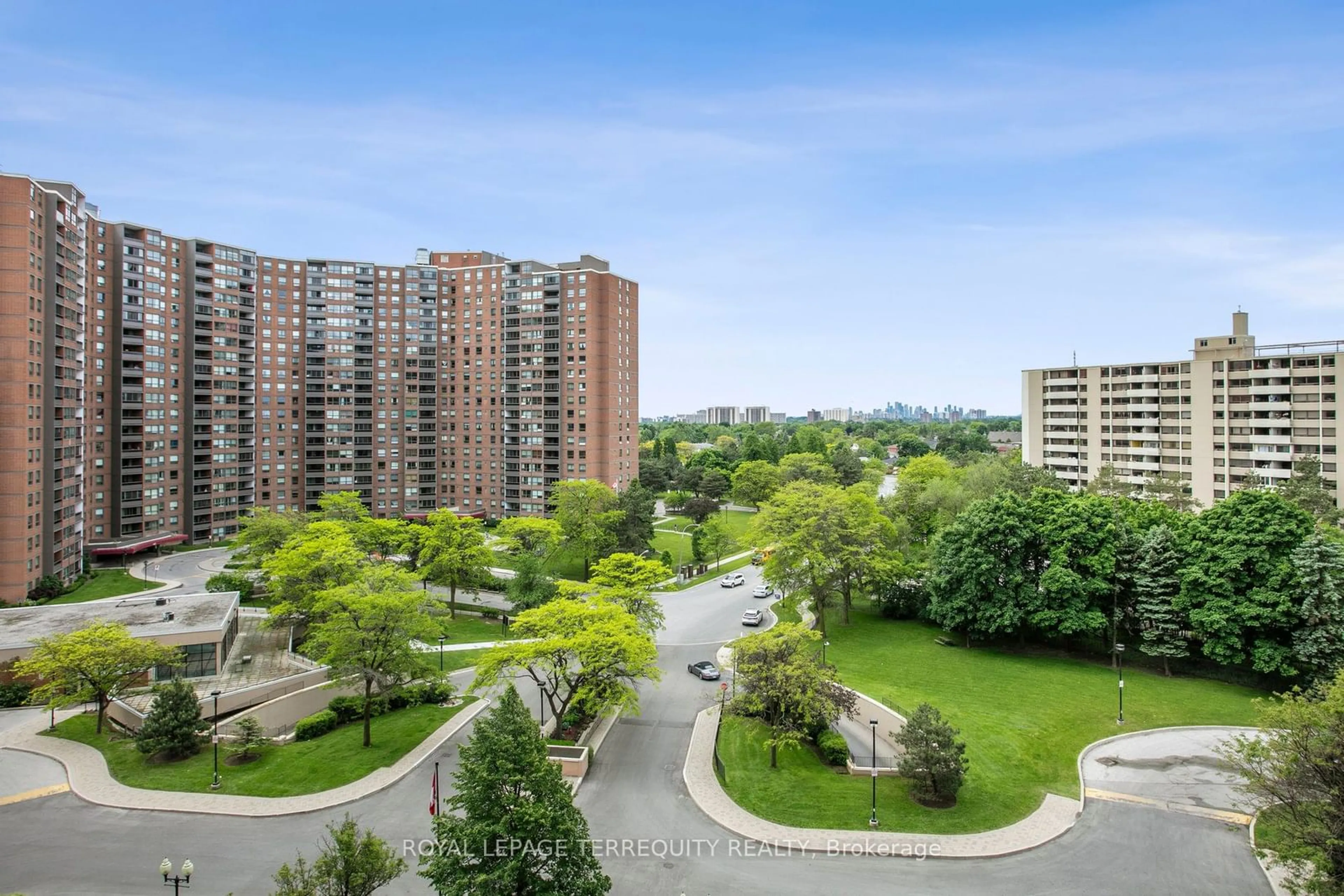 A pic from exterior of the house or condo, the view of city buildings for 714 The West Mall #909, Toronto Ontario M9C 4X1