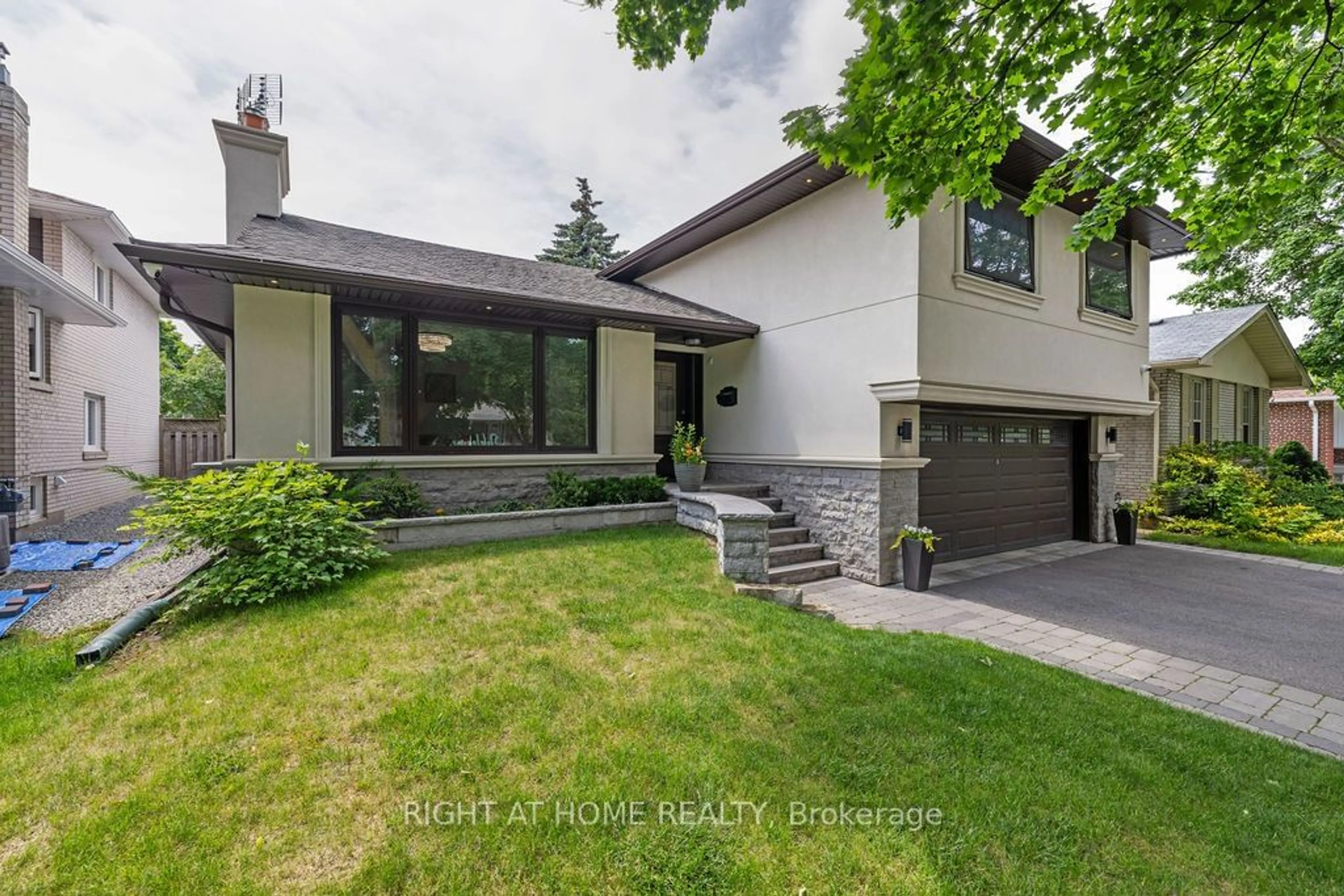 Frontside or backside of a home, the street view for 14 Downpatrick Cres, Toronto Ontario M9R 4A4