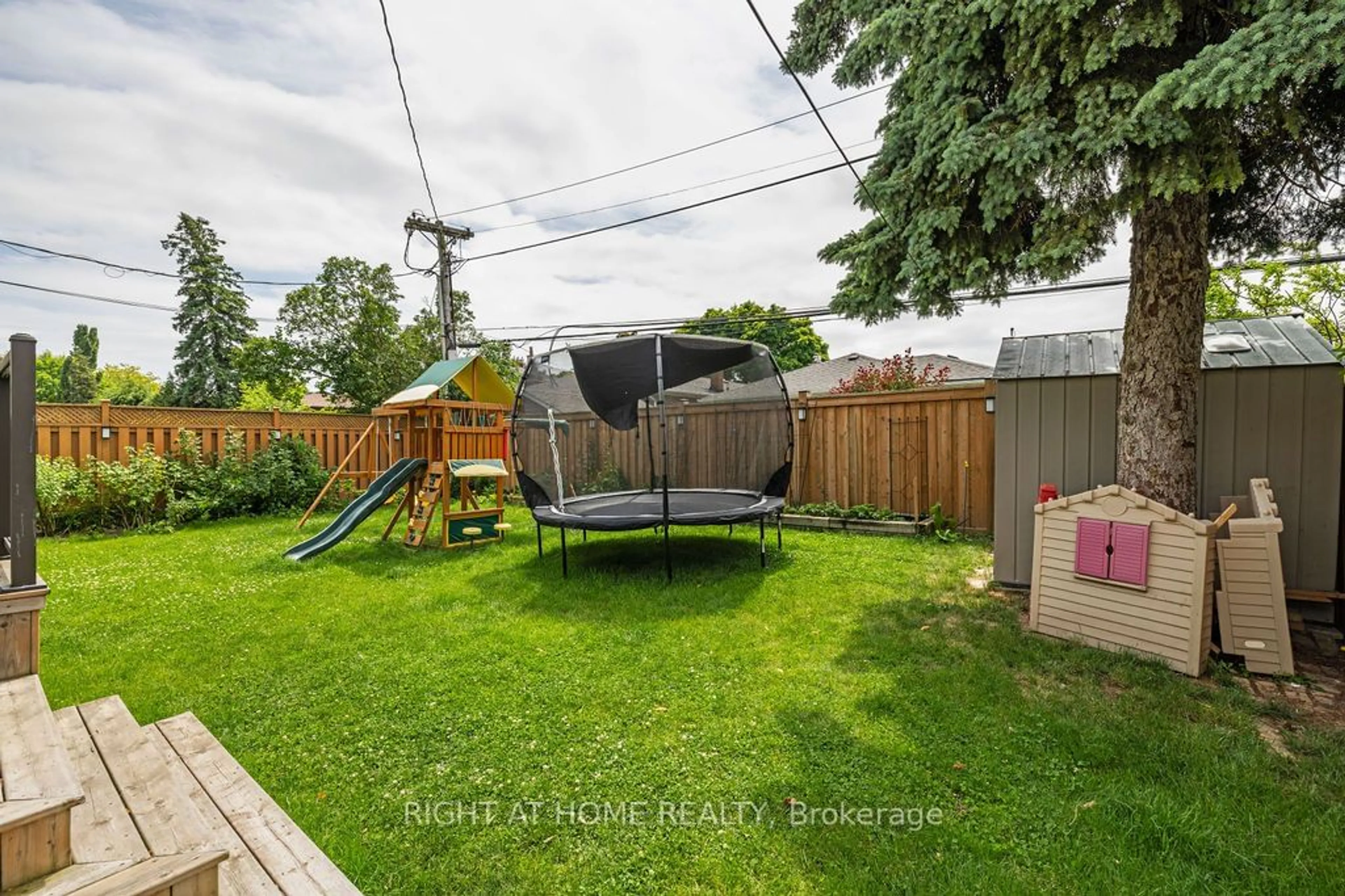 Patio, the fenced backyard for 14 Downpatrick Cres, Toronto Ontario M9R 4A4