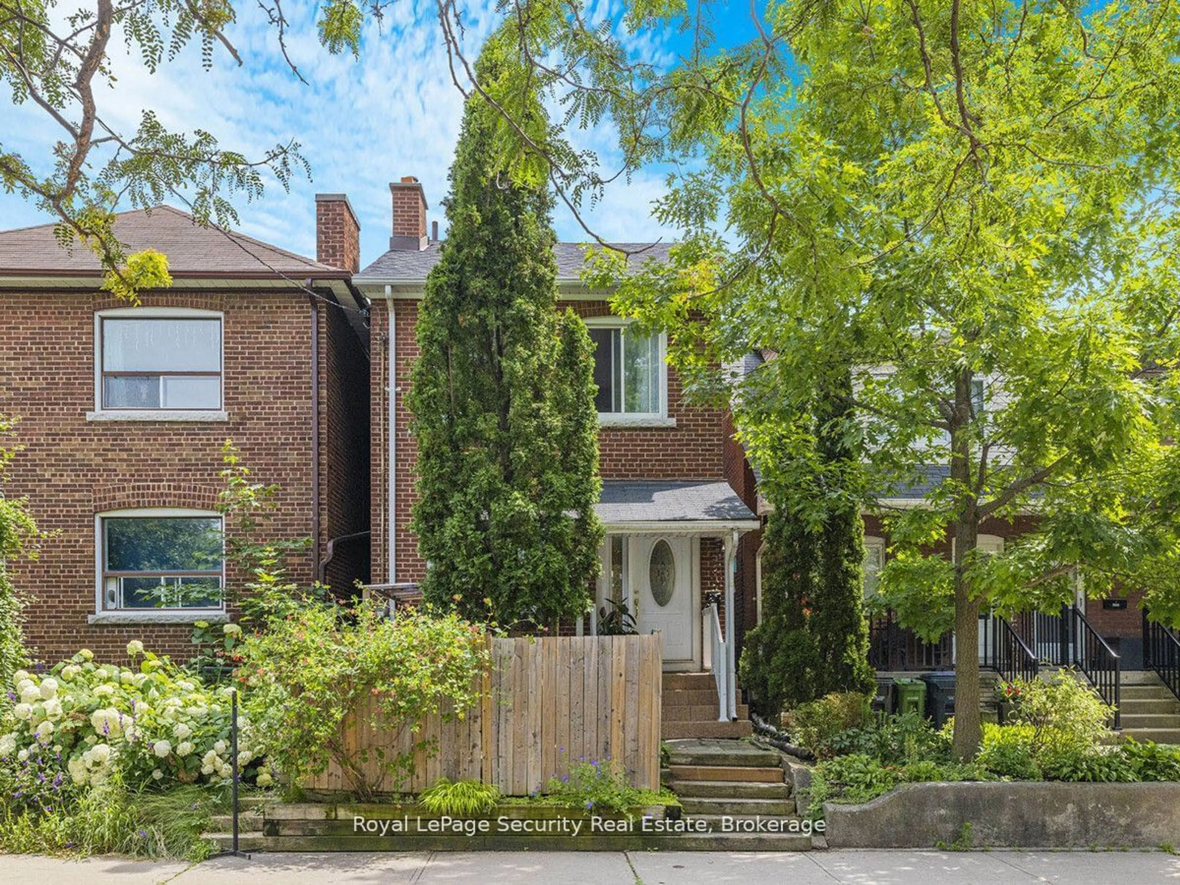 Frontside or backside of a home, the street view for 147 Hope St, Toronto Ontario M6E 1K4