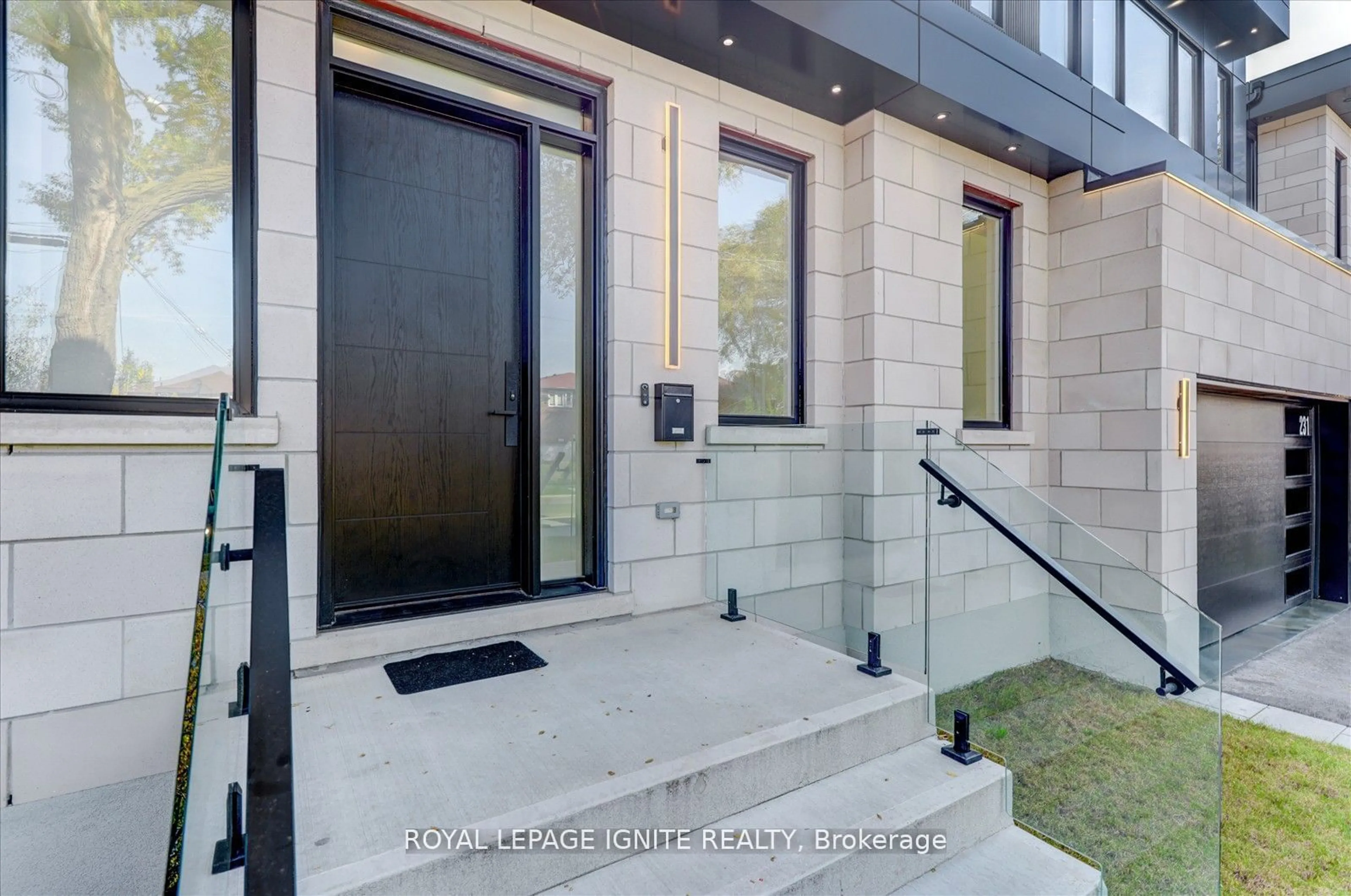 Indoor entryway, wood floors for 231 Falstaff Ave, Toronto Ontario M6L 2G2