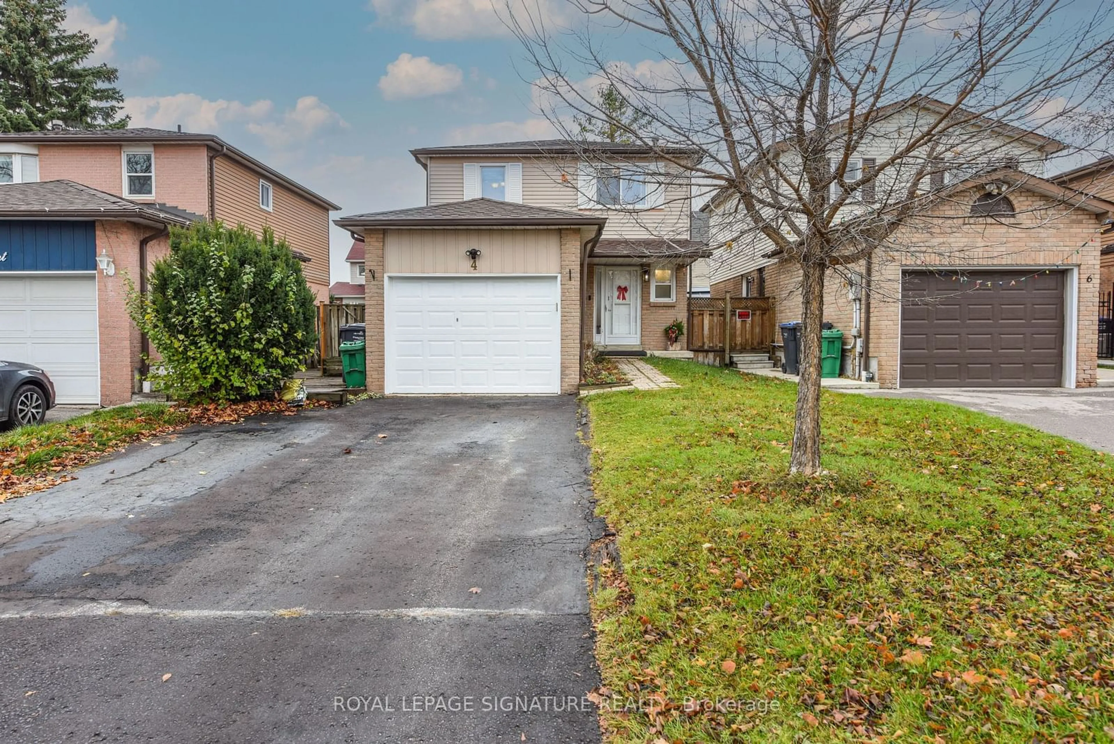 A pic from exterior of the house or condo, the fenced backyard for 4 Greenleaf Cres, Brampton Ontario L6X 2V6