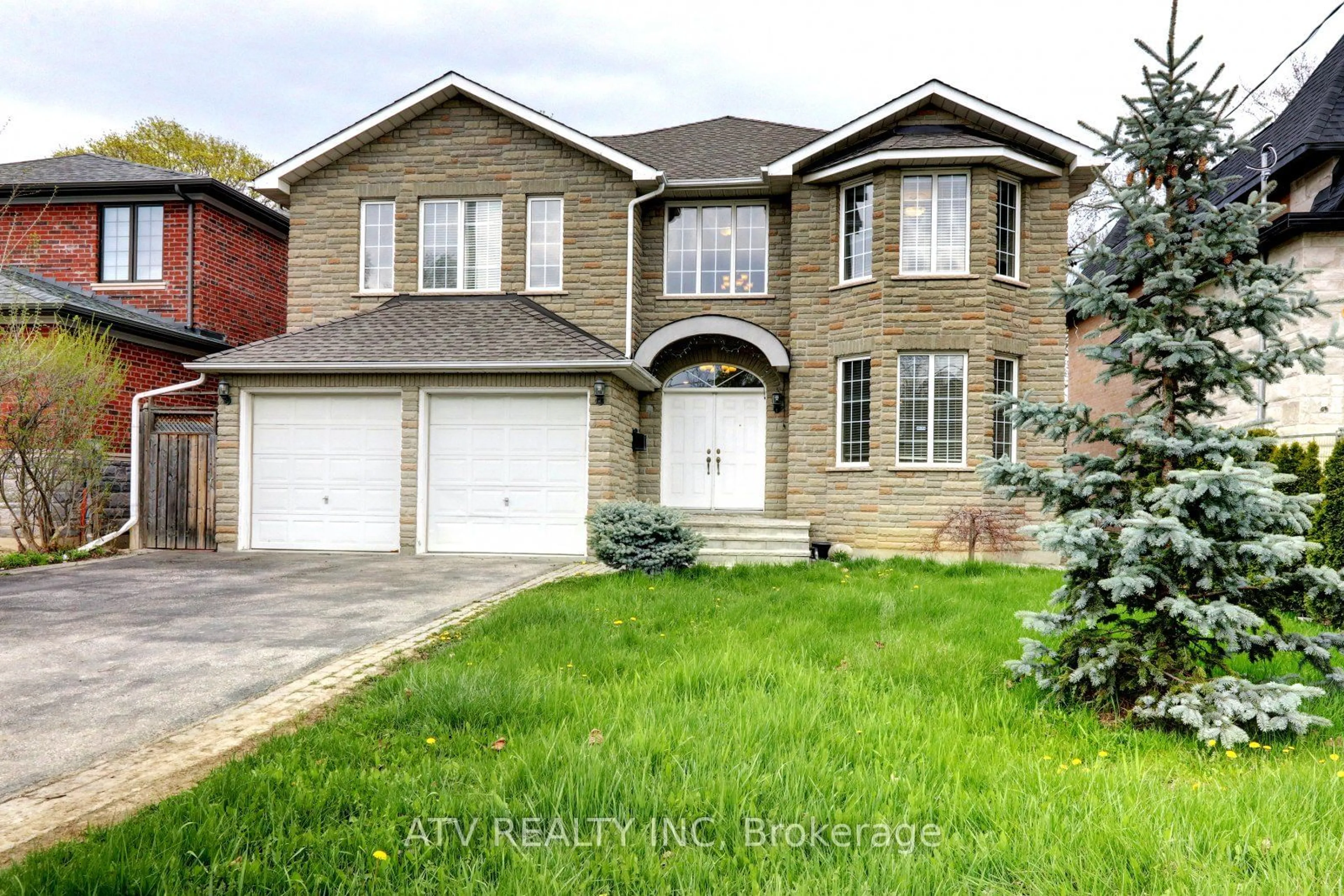 Frontside or backside of a home, the street view for 31 Shaver Ave, Toronto Ontario M9B 3T2