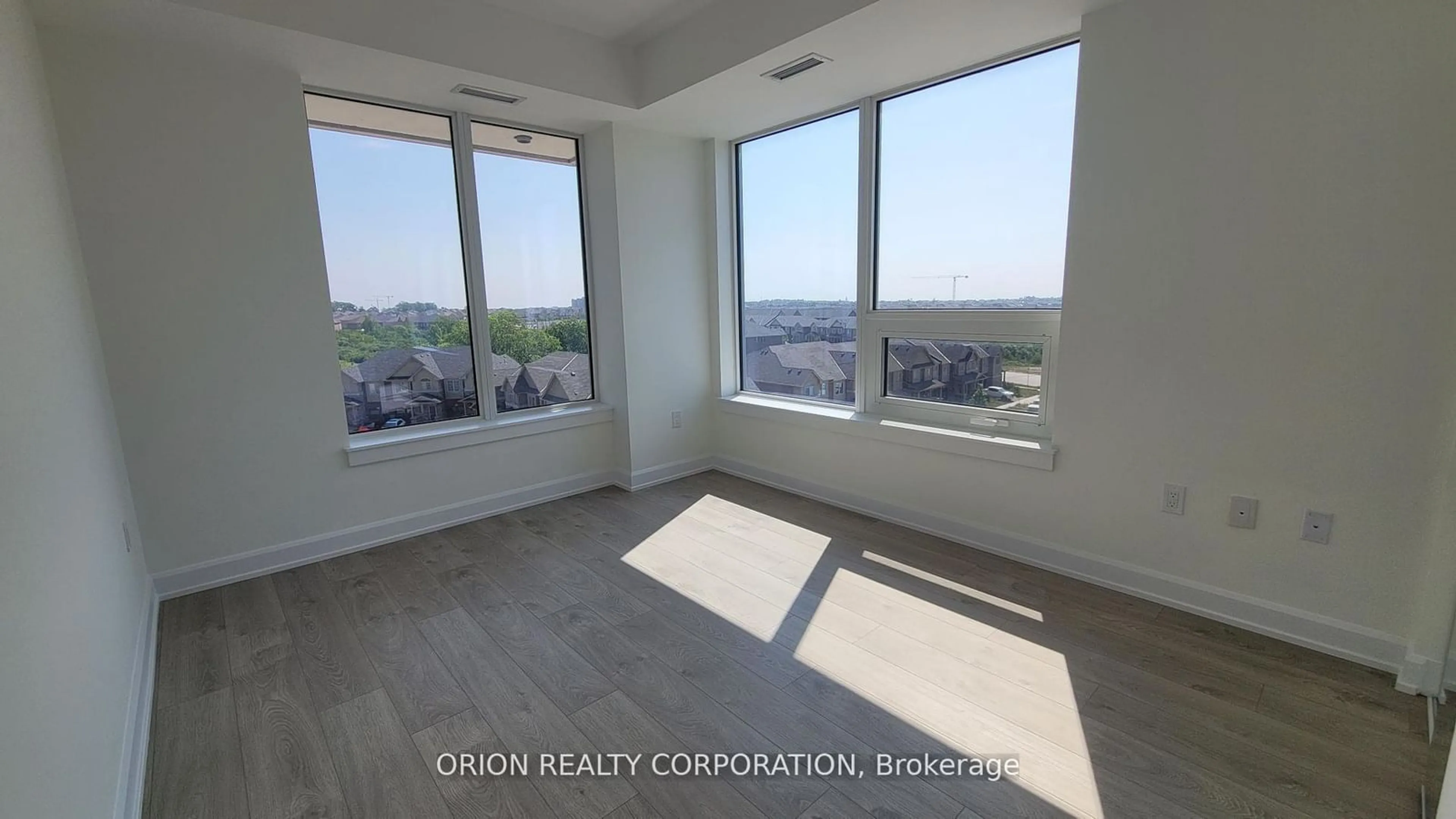 A pic of a room, wood floors for 3200 William Coltson Ave #508, Oakville Ontario L6H 7W6