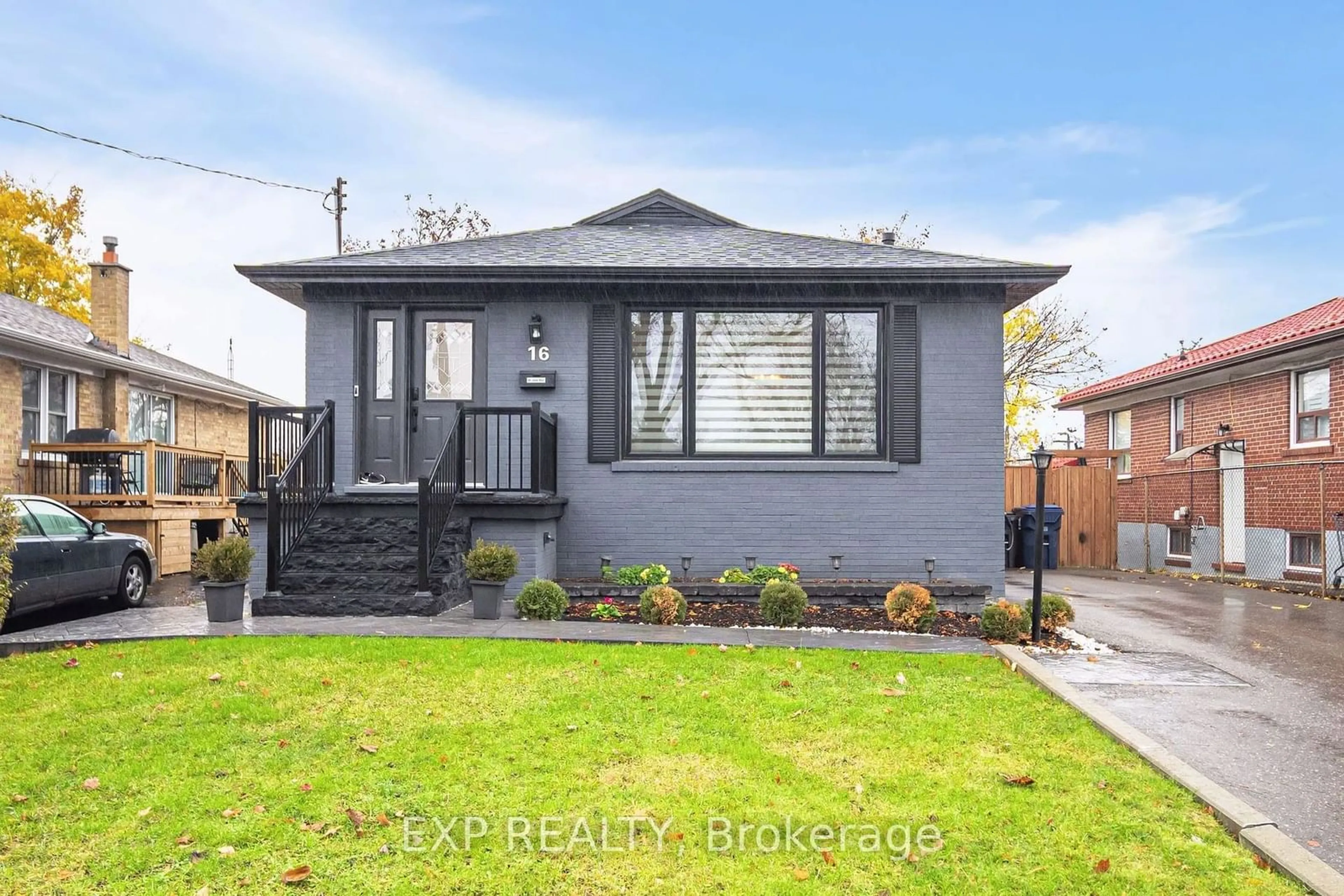 Frontside or backside of a home, the fenced backyard for 16 Benway Dr, Toronto Ontario M9W 1Z3