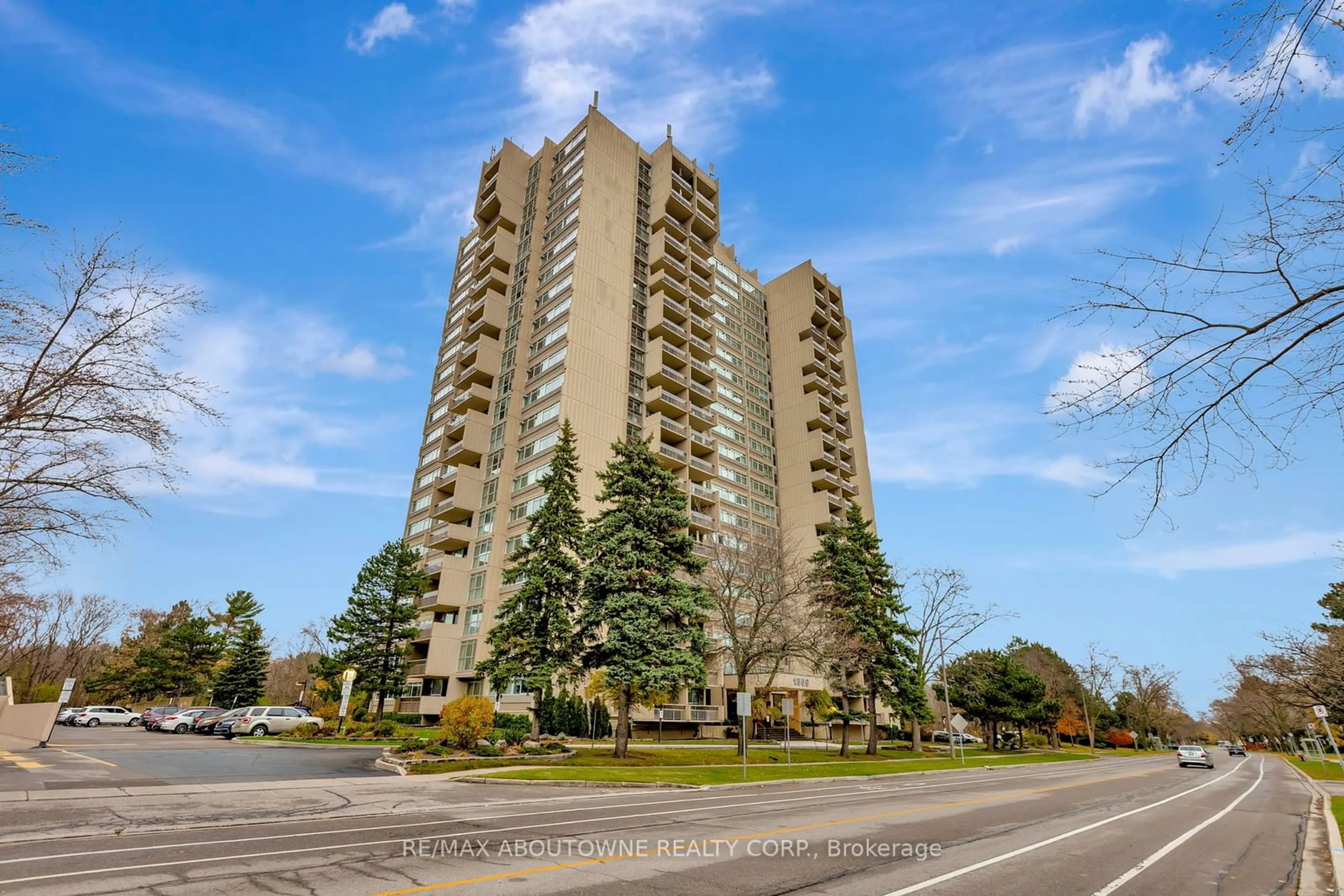 A pic from exterior of the house or condo, the street view for 1389 White Oaks Blvd #202, Oakville Ontario L6H 2R8