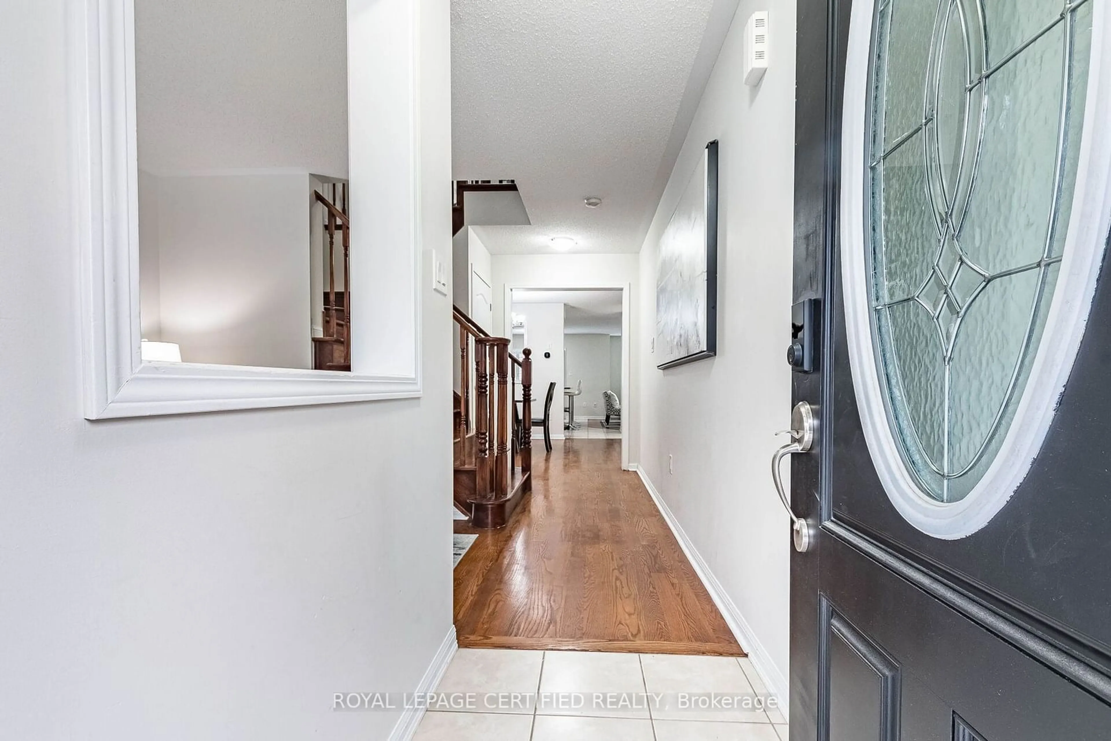 Indoor entryway, wood floors for 676 Speyer Circ, Milton Ontario L9T 0Y6