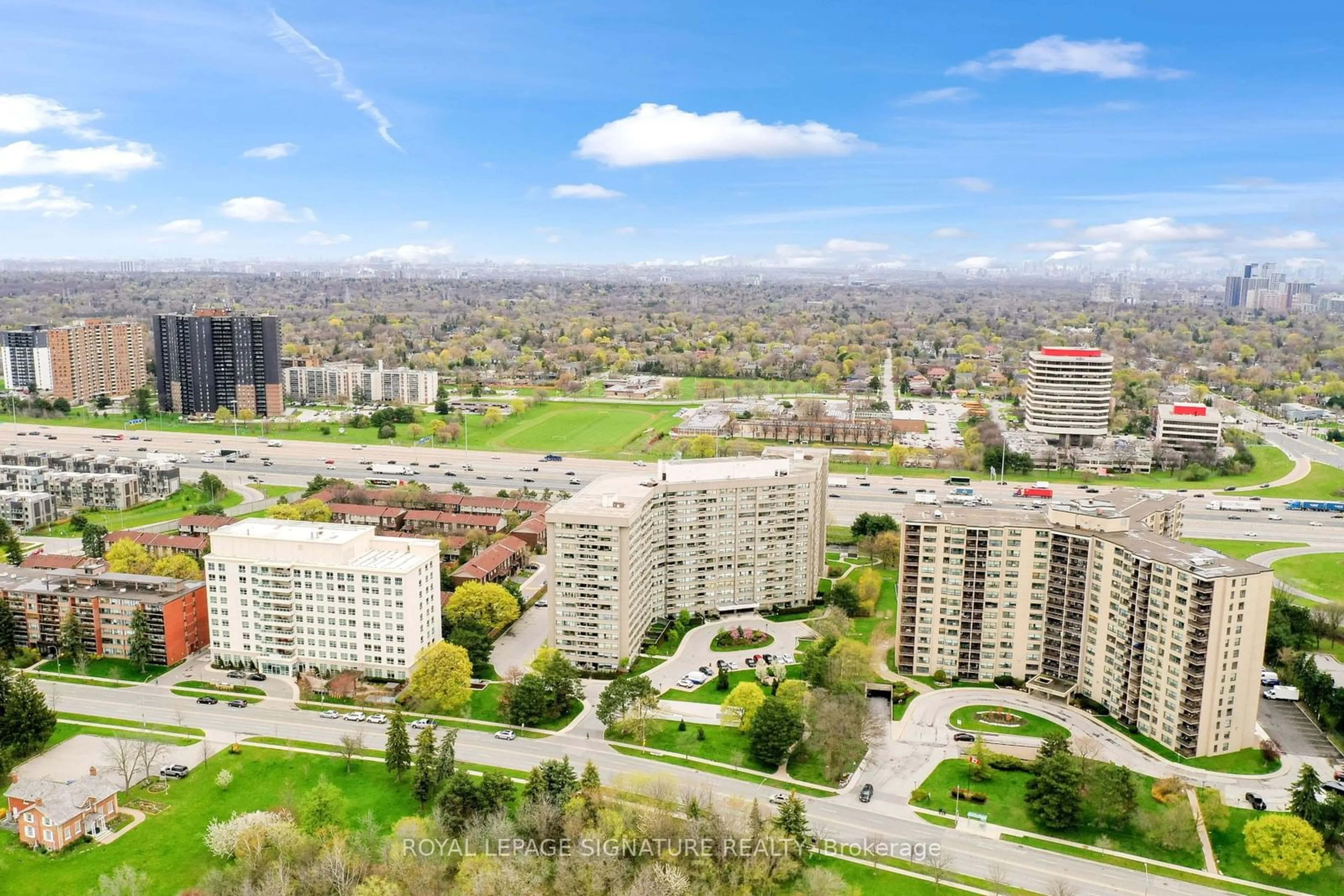 A pic from exterior of the house or condo, the view of city buildings for 716 The West Mall #1507, Toronto Ontario M9C 4Y4