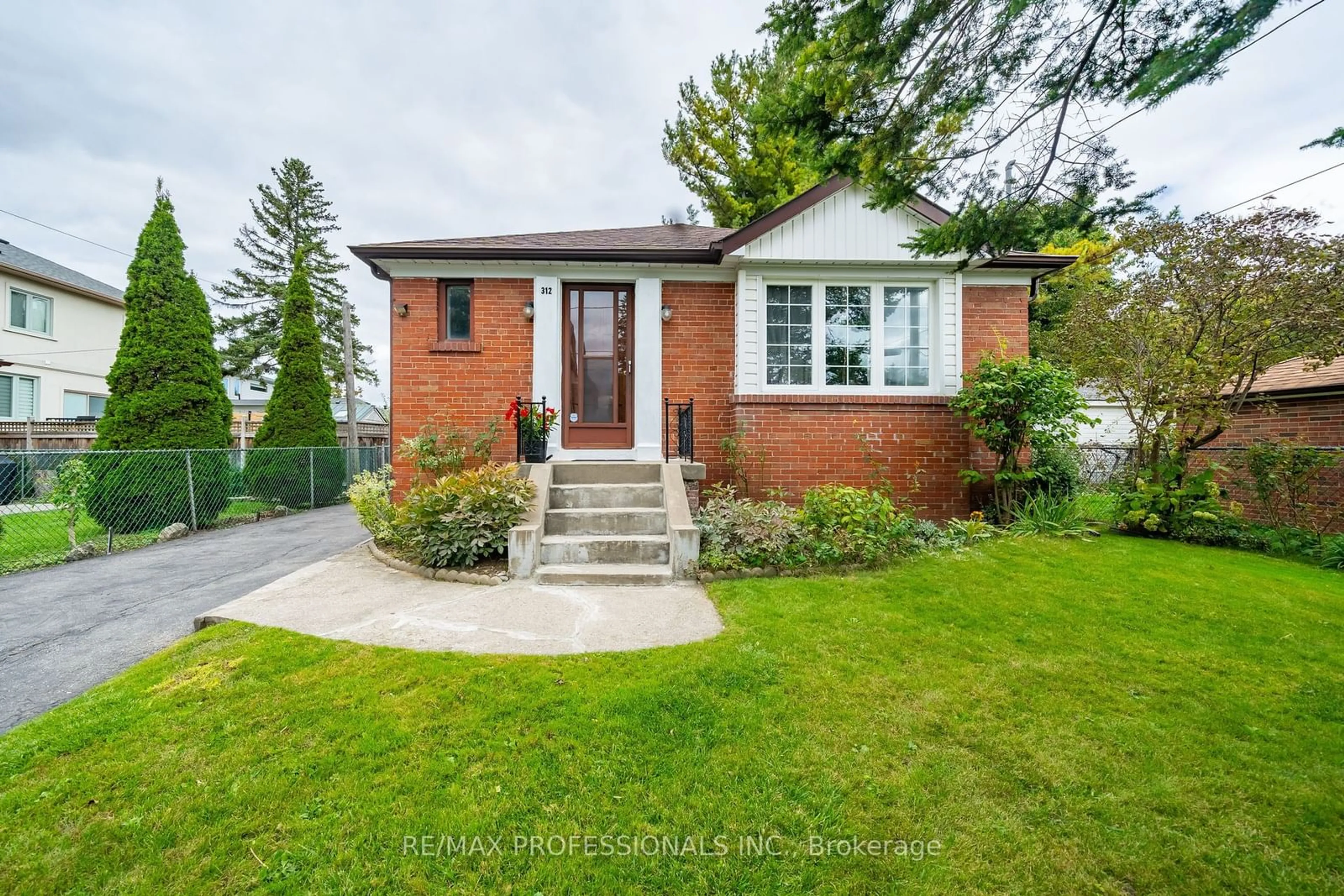 Home with brick exterior material for 312 Dalesford Rd, Toronto Ontario M8Y 1G7