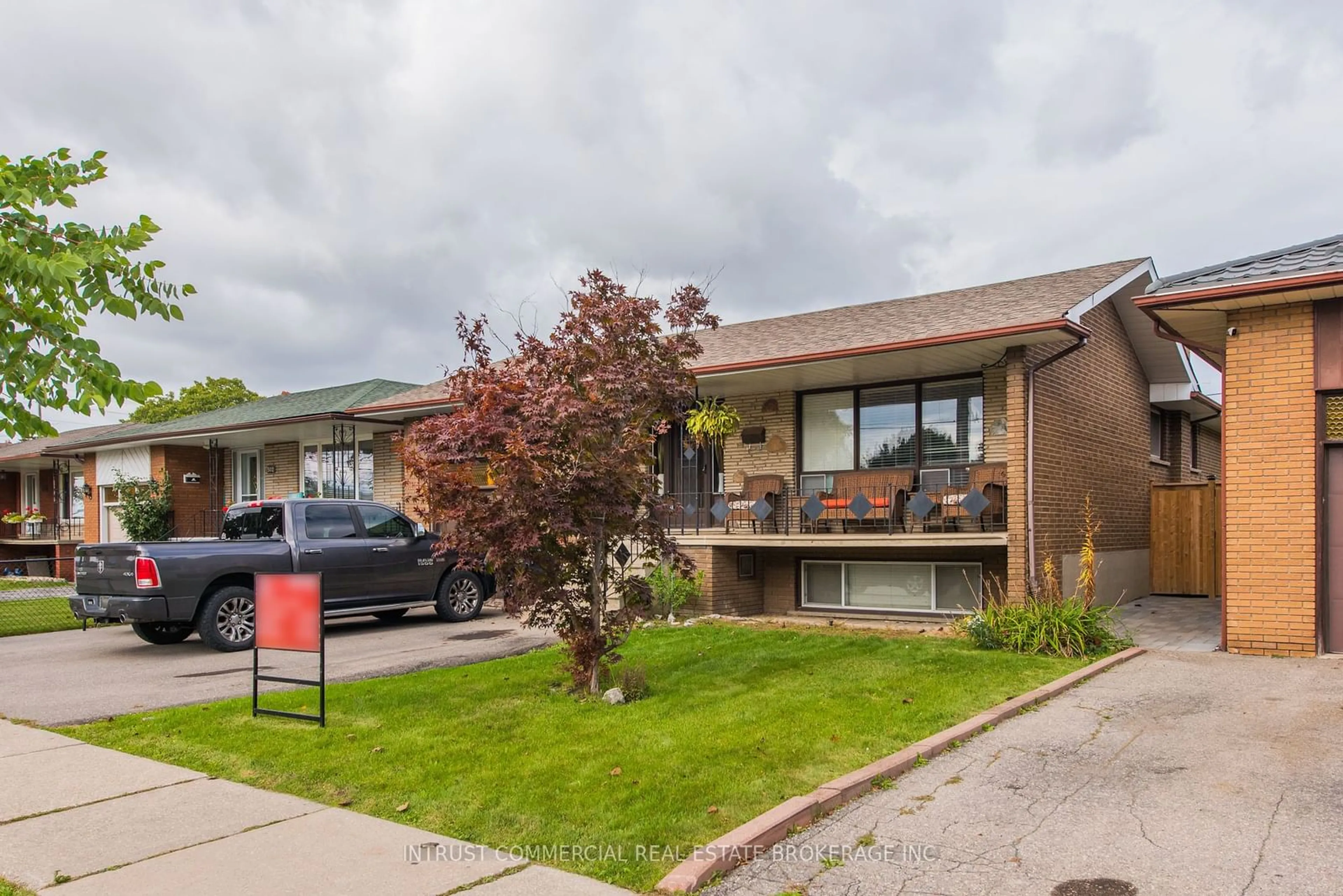 Frontside or backside of a home, the street view for 500 Rathburn Rd, Toronto Ontario M9C 3S8