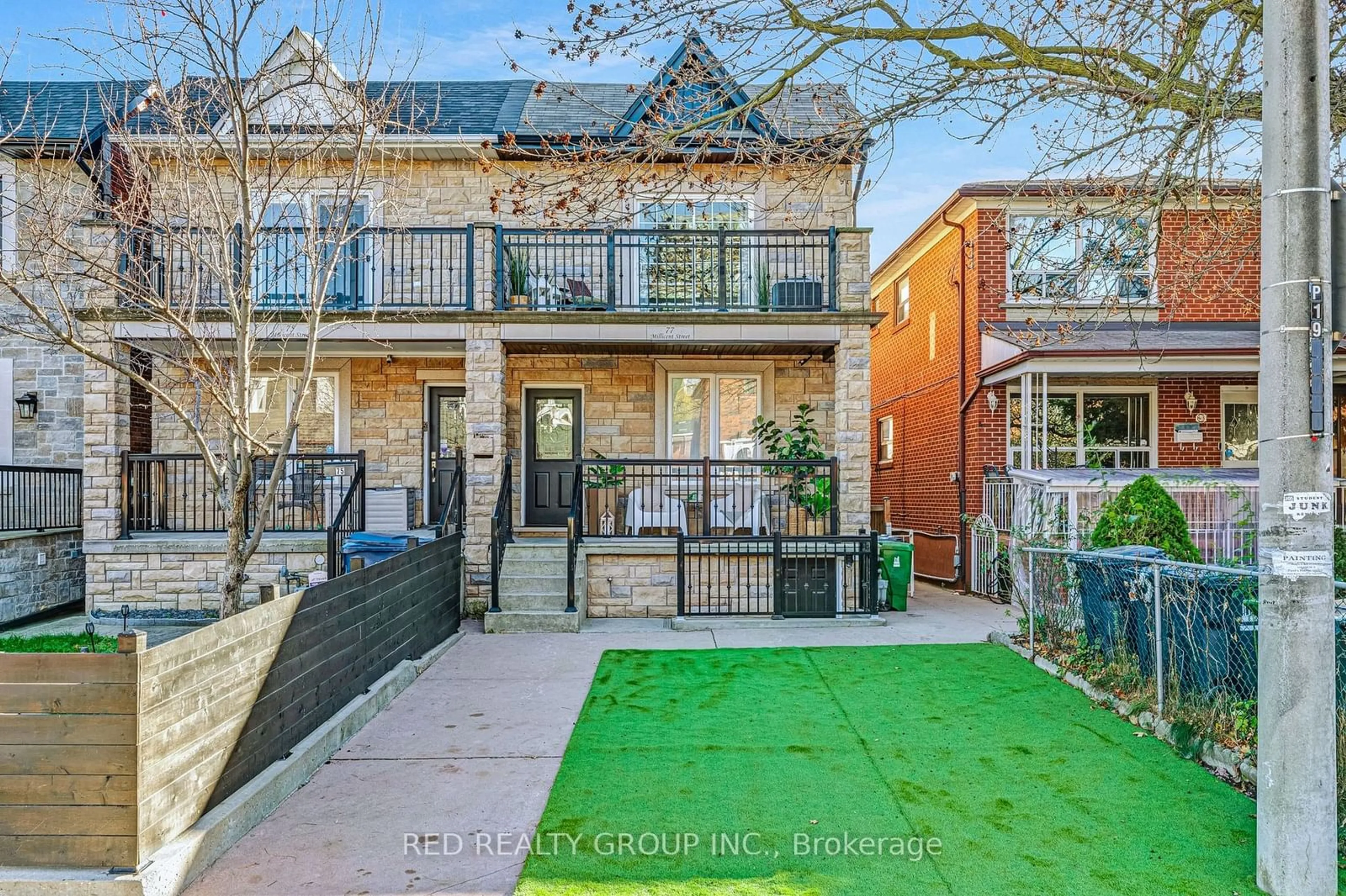 A pic from exterior of the house or condo, the fenced backyard for 77 Millicent St, Toronto Ontario M6H 1W3