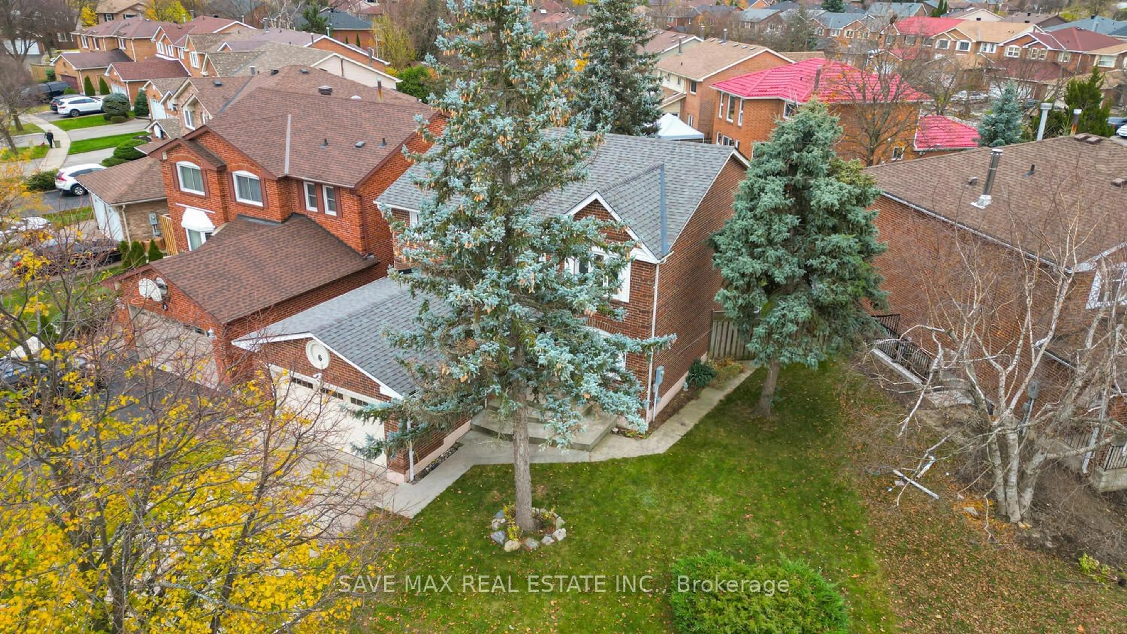 A pic from exterior of the house or condo, the fenced backyard for 6 Campkin St, Brampton Ontario L6Y 3H2