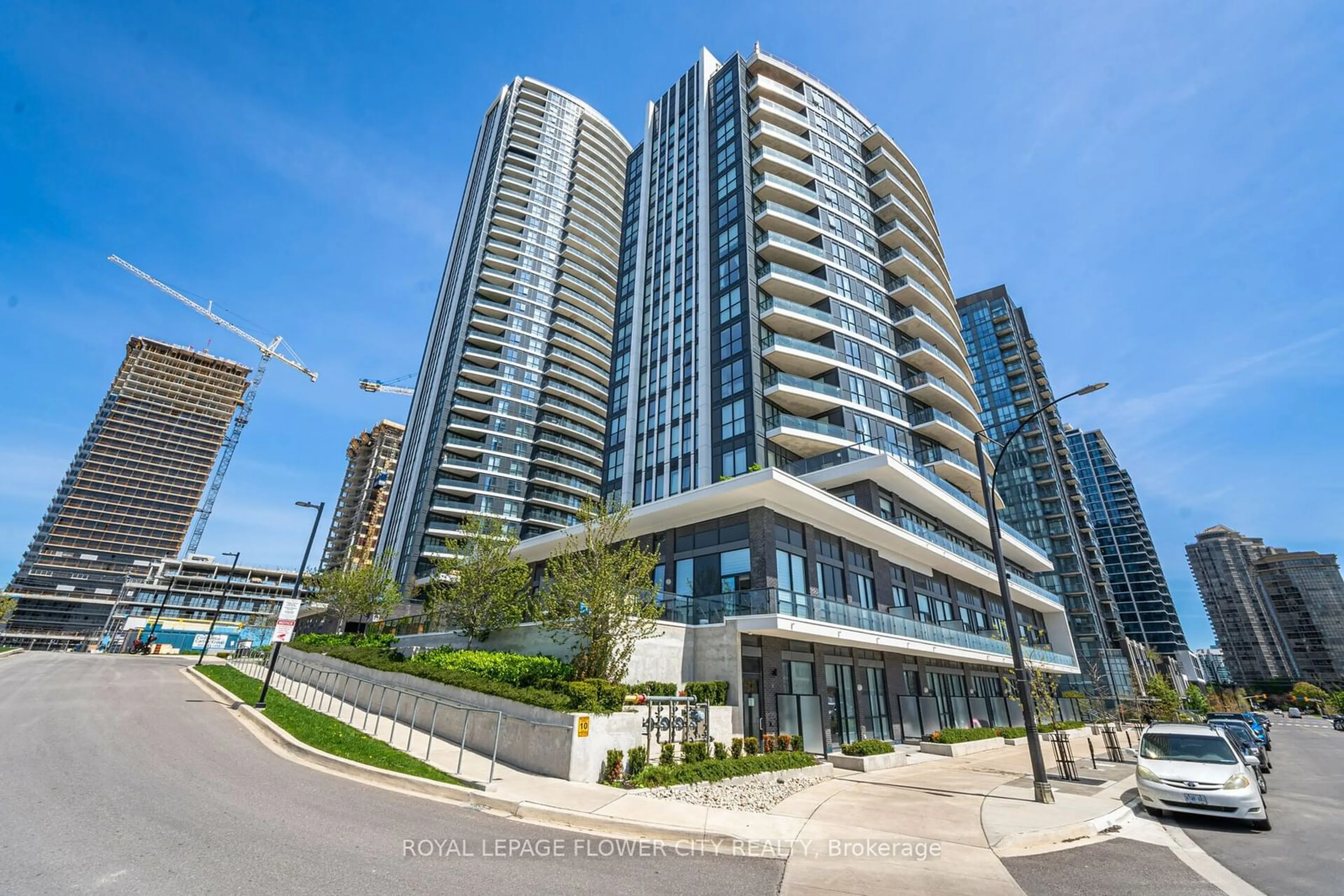 A pic from exterior of the house or condo, the view of city buildings for 65 Watergarden Dr #709, Mississauga Ontario L5R 0G9