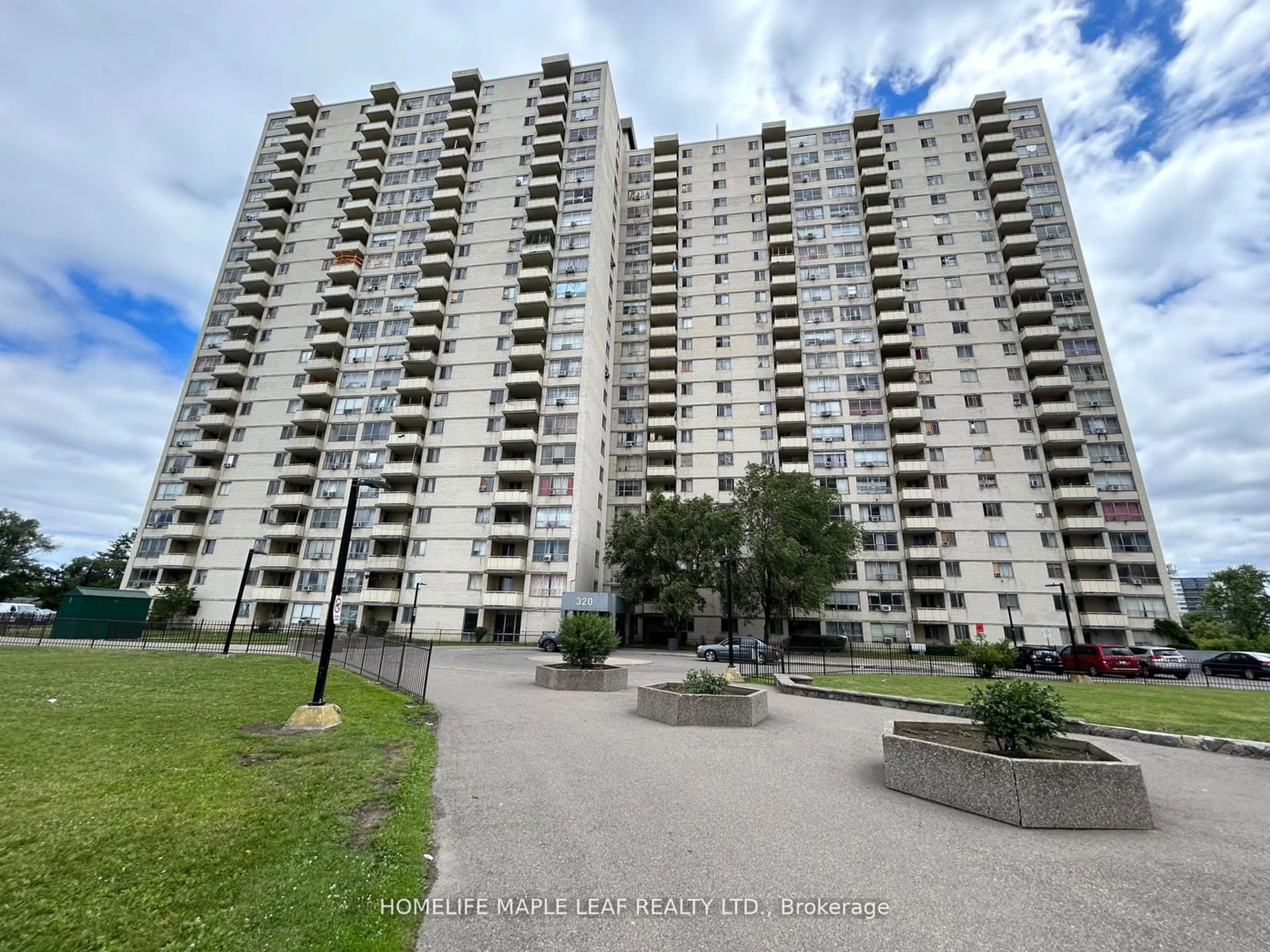 A pic from exterior of the house or condo, the front or back of building for 320 Dixon Rd #703, Toronto Ontario M9R 1S8