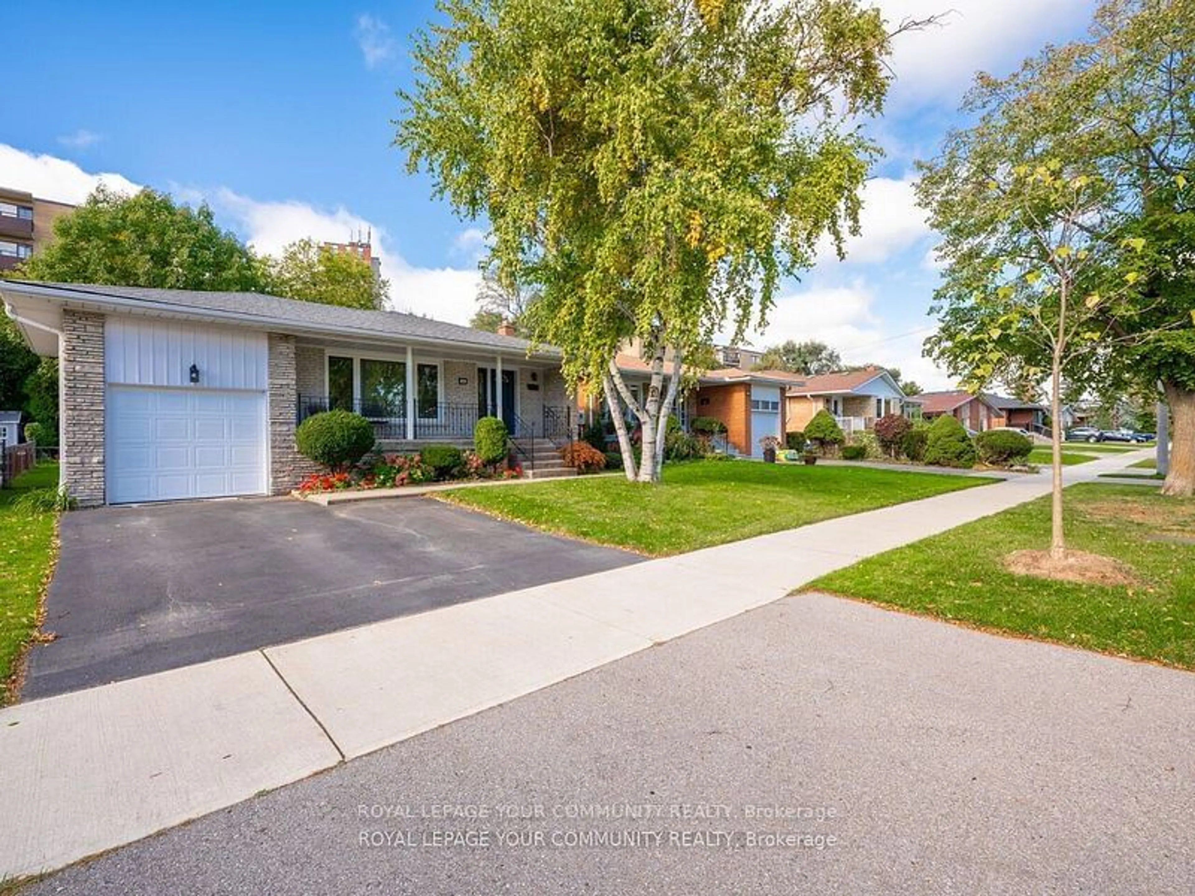 Frontside or backside of a home, the street view for 38 Vanguard Dr, Toronto Ontario M9B 5E6