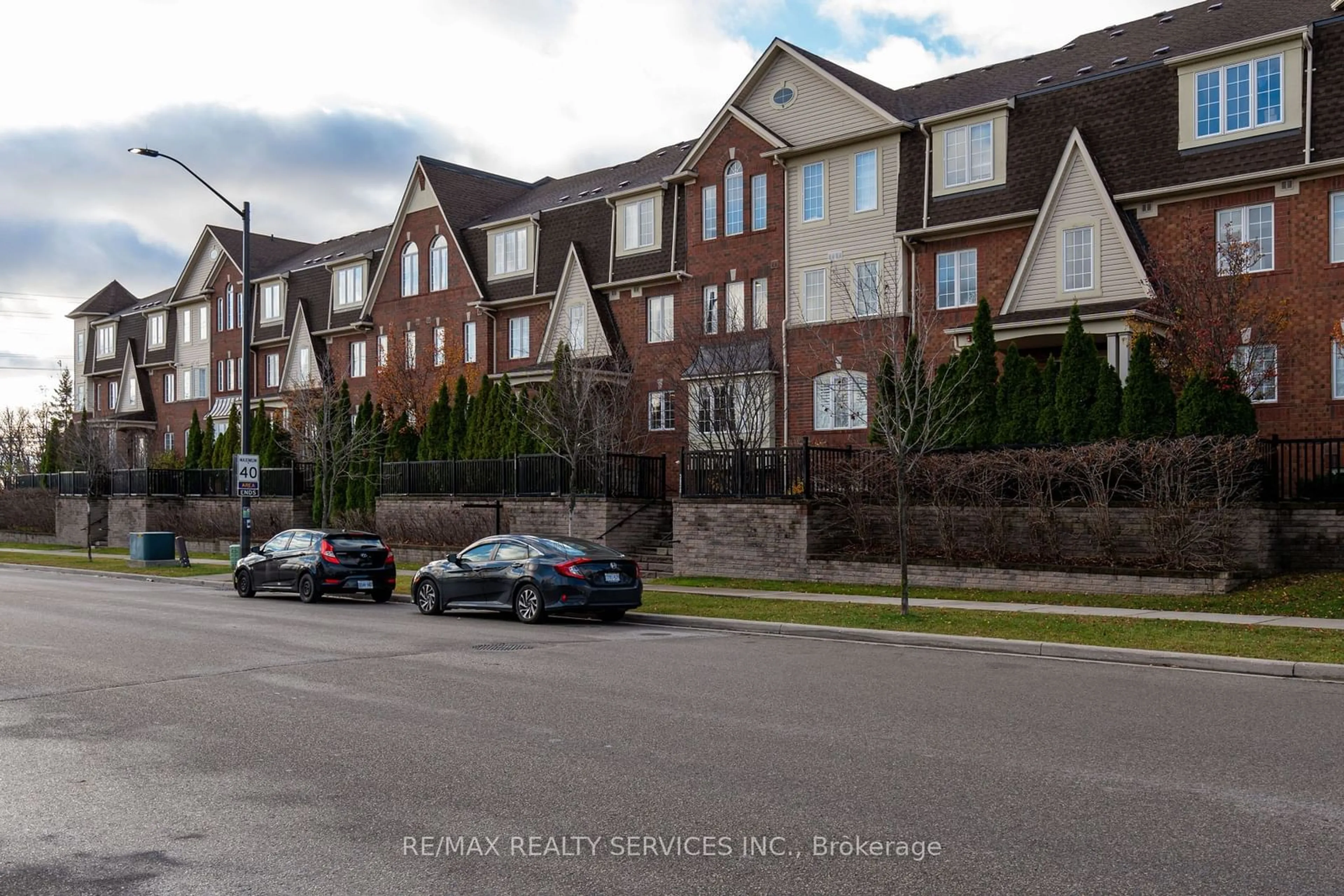 A pic from exterior of the house or condo, the street view for 3032 Clayhill Rd #1, Mississauga Ontario L5B 0B1