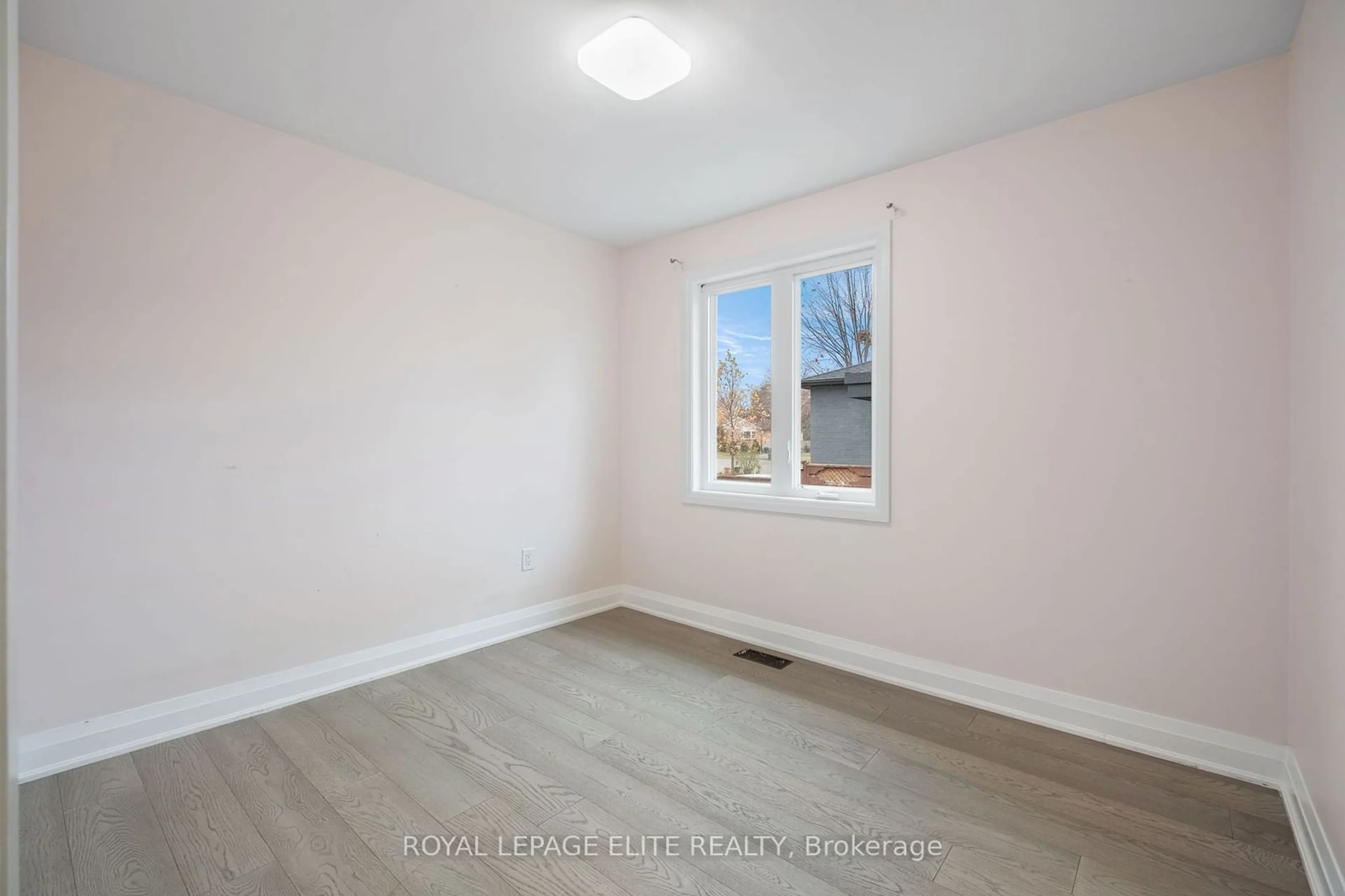 A pic of a room, wood floors for 6 LACHINE Crt, Toronto Ontario M9C 4A5