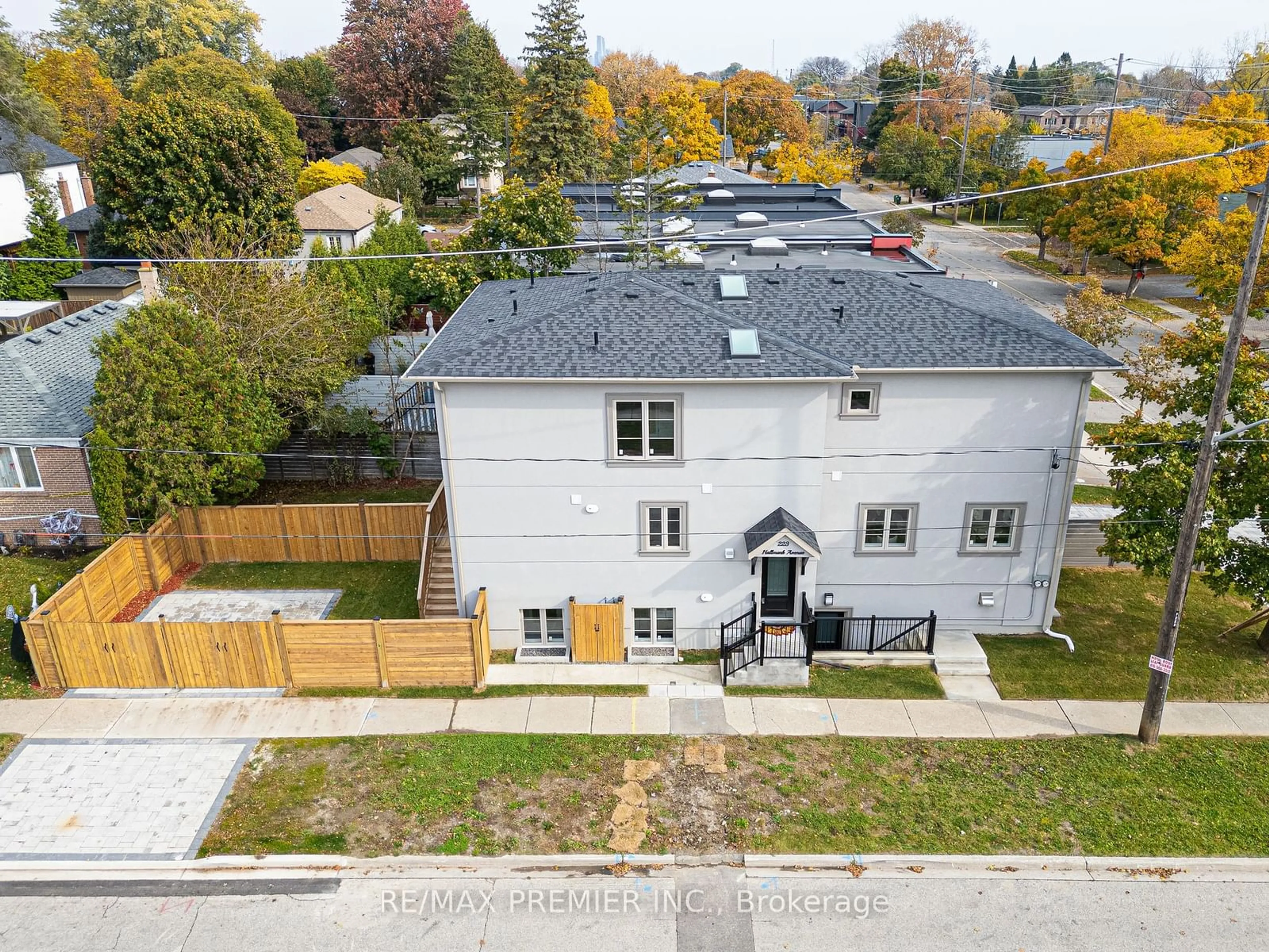 Frontside or backside of a home, the fenced backyard for 223 Hallmark Ave, Toronto Ontario M8W 2M4