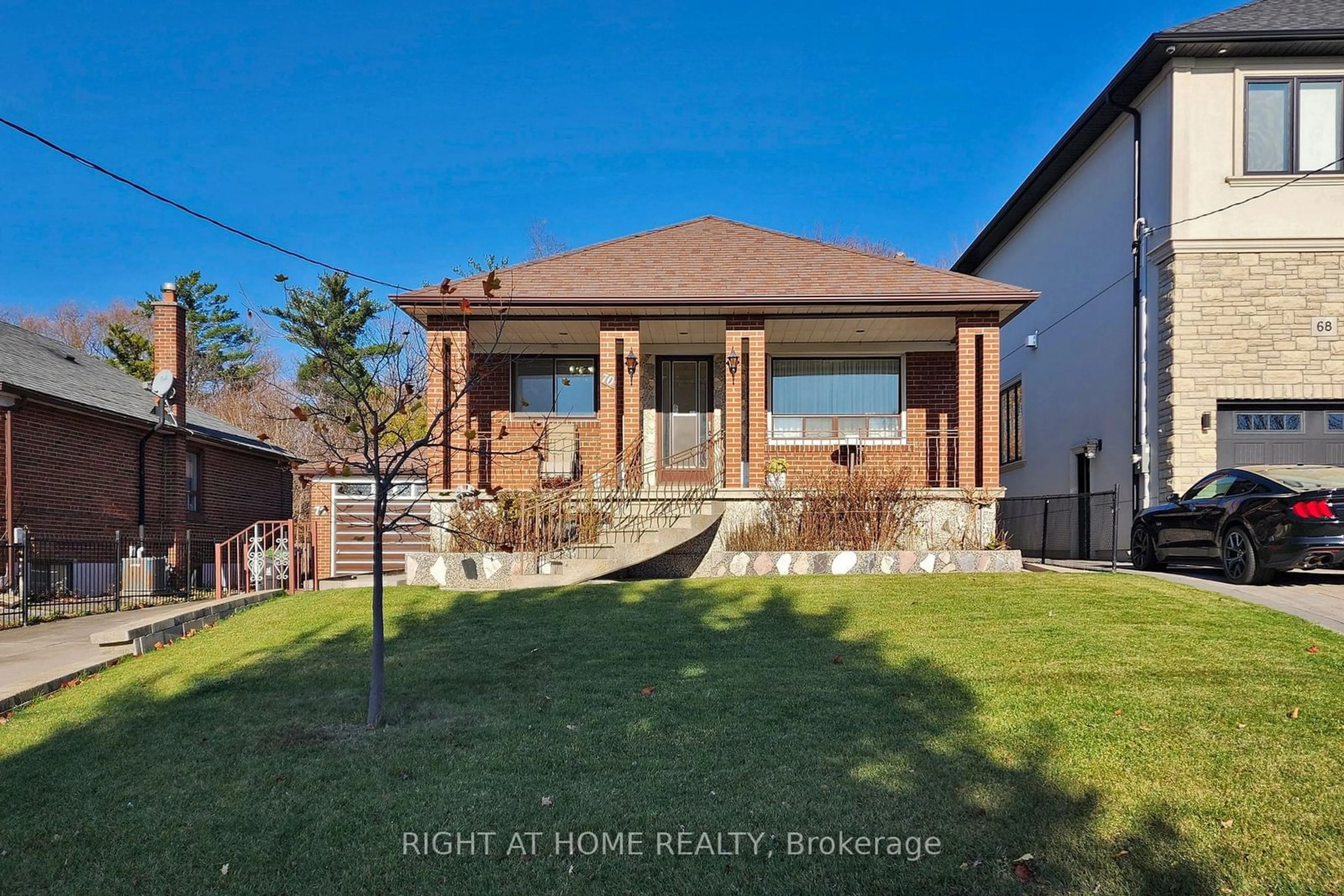 Frontside or backside of a home, the fenced backyard for 70 Forthbridge Cres, Toronto Ontario M3M 2A3