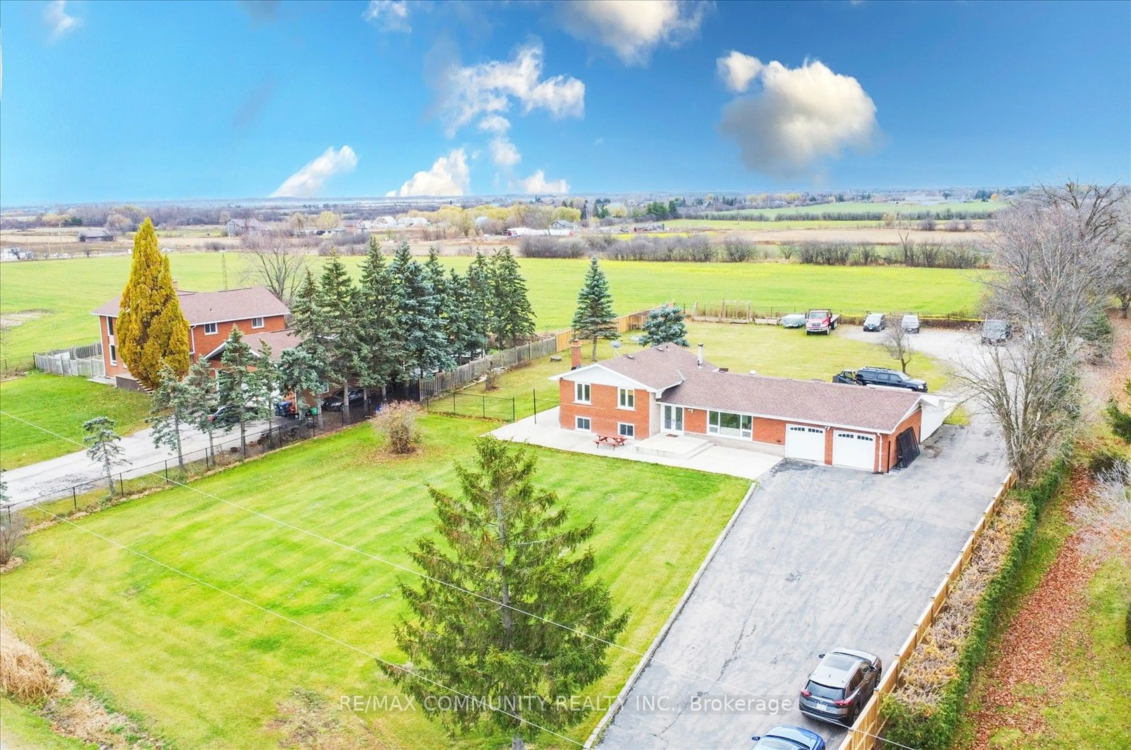 A pic from exterior of the house or condo, the fenced backyard for 13096 Centreville Creek Rd, Caledon Ontario L7C 3A7