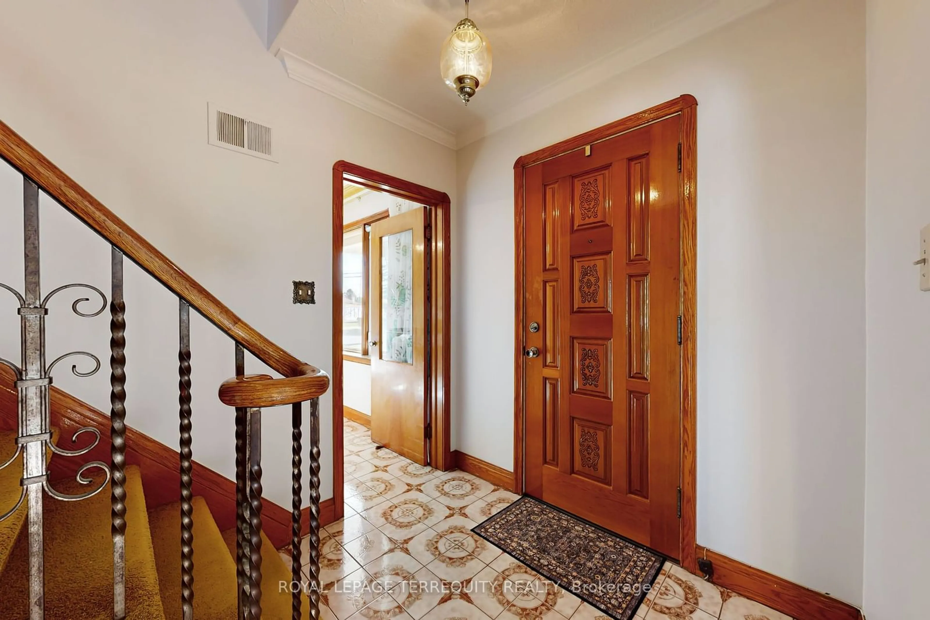 Indoor foyer, wood floors for 202 Rustic Rd, Toronto Ontario M6L 1W4