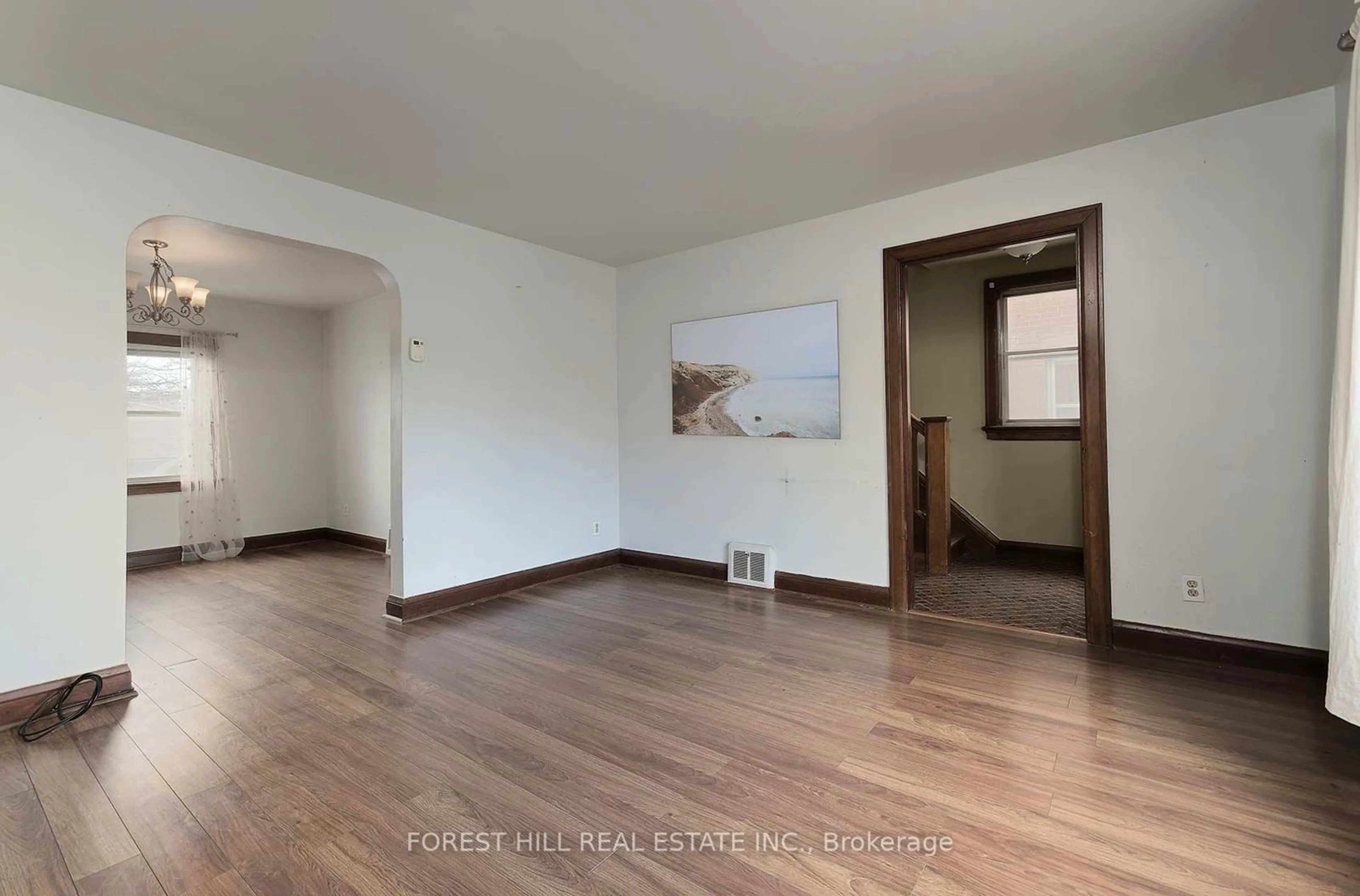 A pic of a room, wood floors for 71 Trowell Ave, Toronto Ontario M6M 1L5