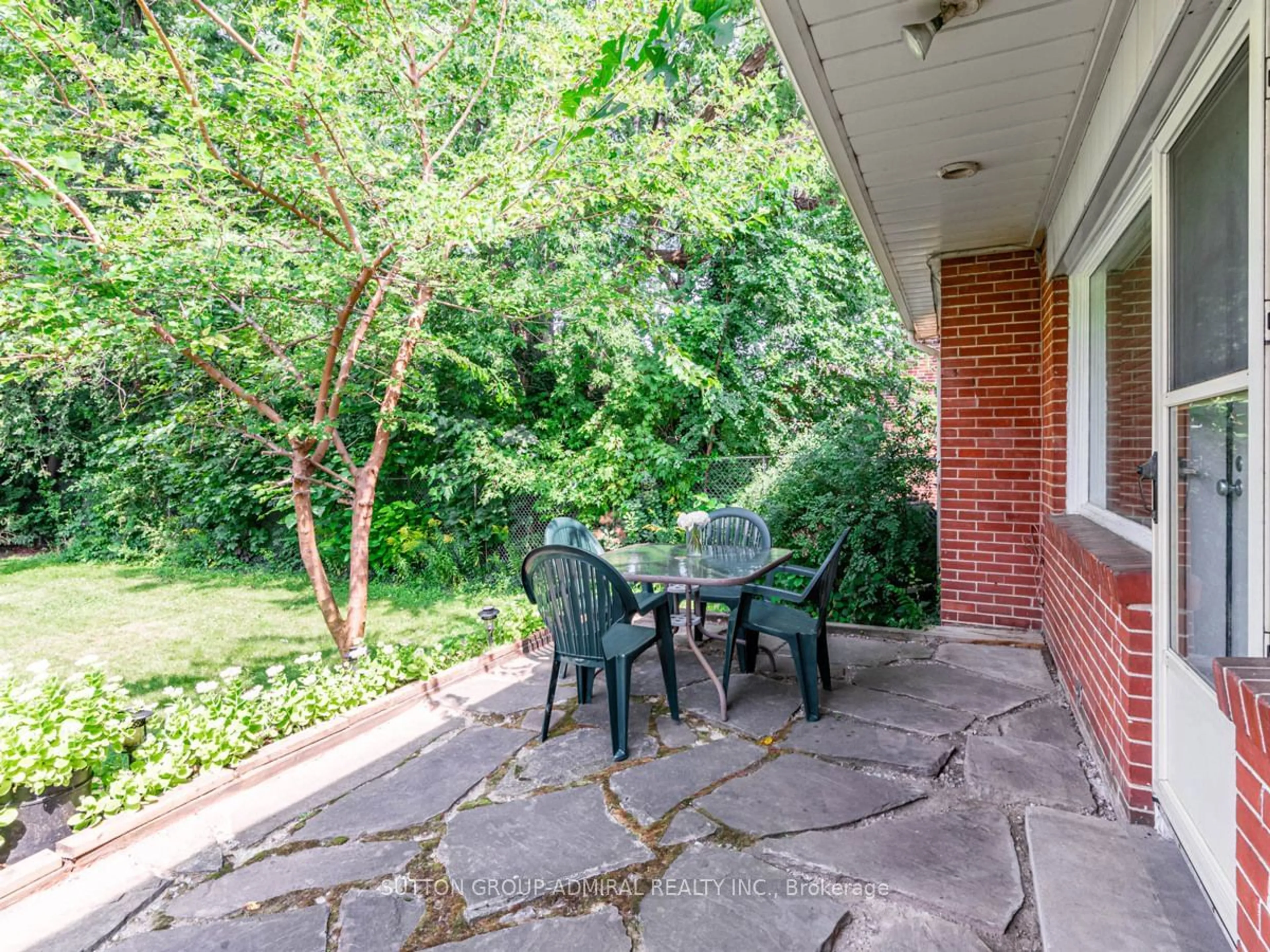 Patio, the fenced backyard for 86 North Park Dr, Toronto Ontario M6L 1K2