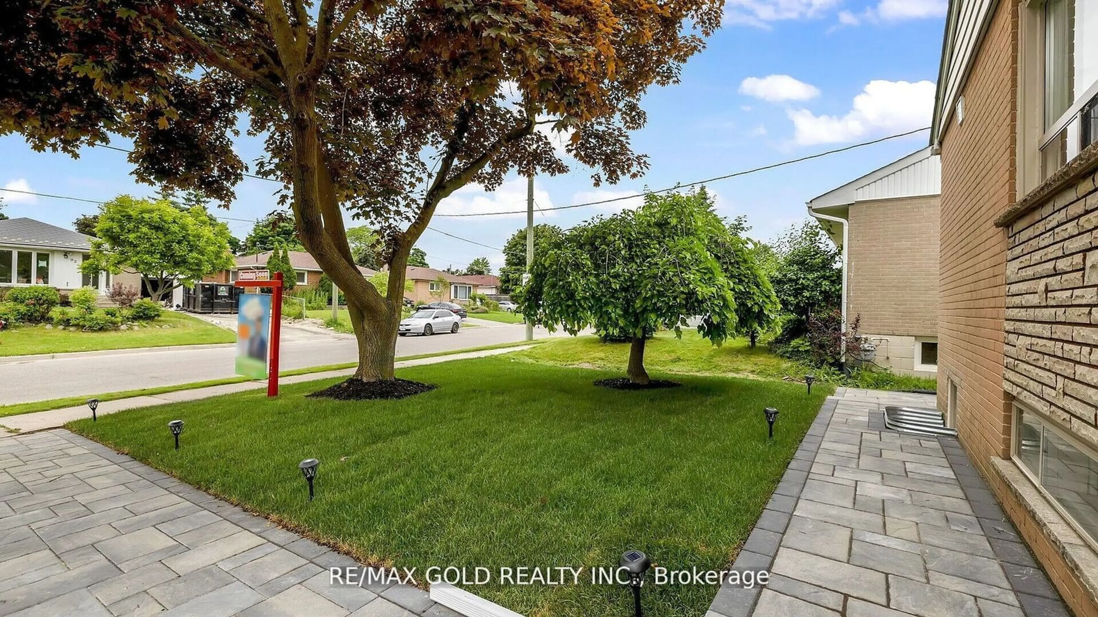 A pic from exterior of the house or condo, the fenced backyard for 93 Cornwall Rd, Brampton Ontario L6W 1N7