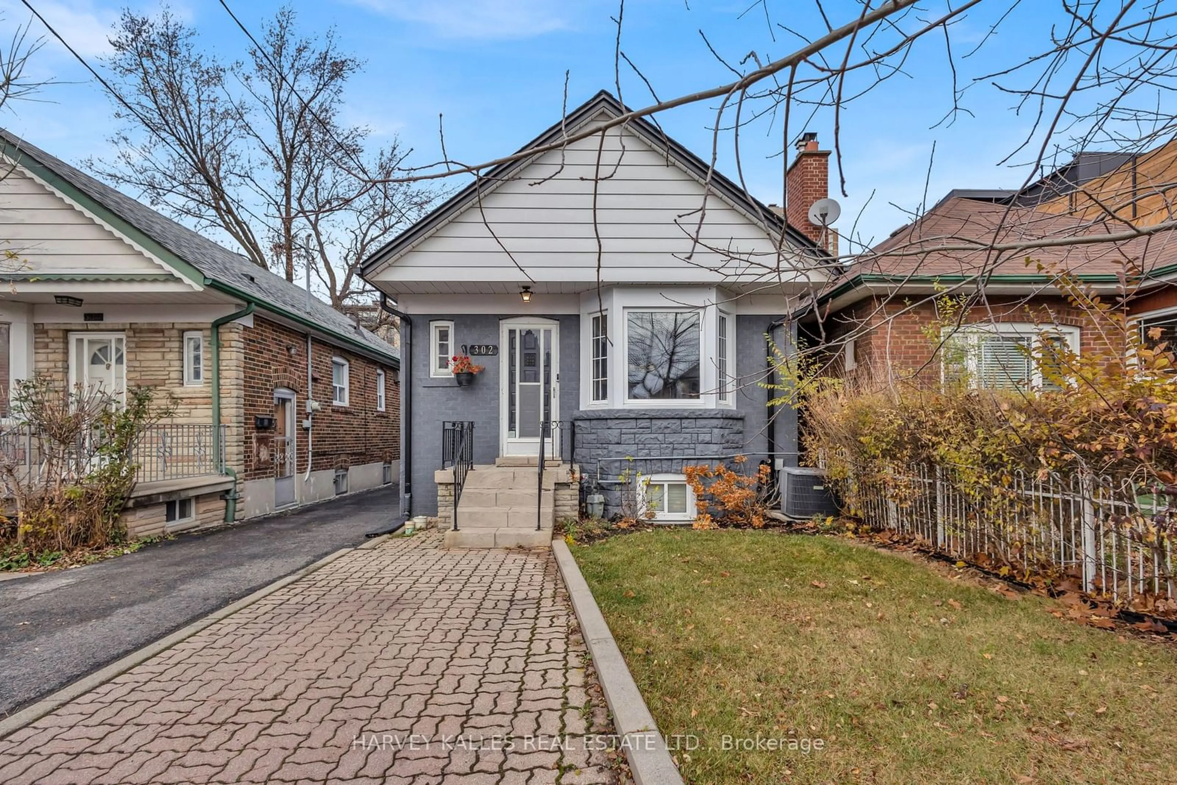 Frontside or backside of a home, cottage for 302 Whitmore Ave, Toronto Ontario M6E 2N4