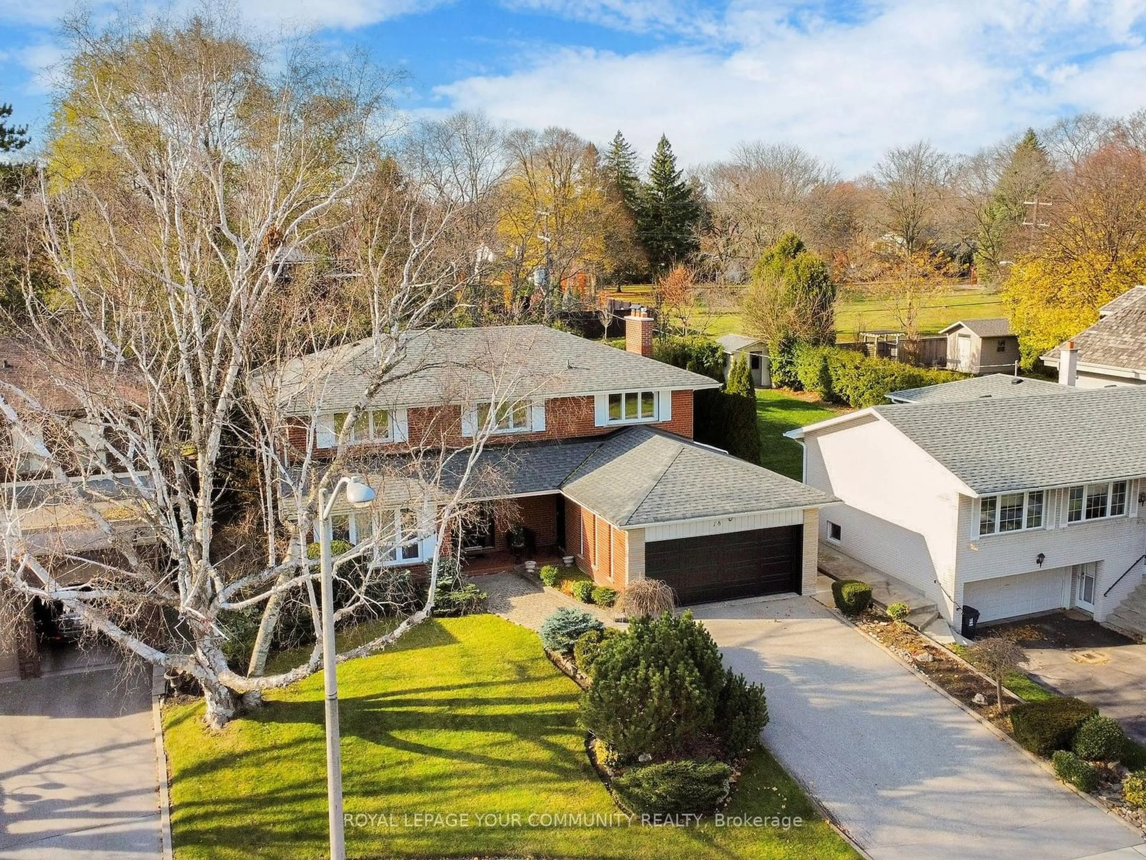 Frontside or backside of a home, the street view for 18 Courtsfield Cres, Toronto Ontario M9A 4S9