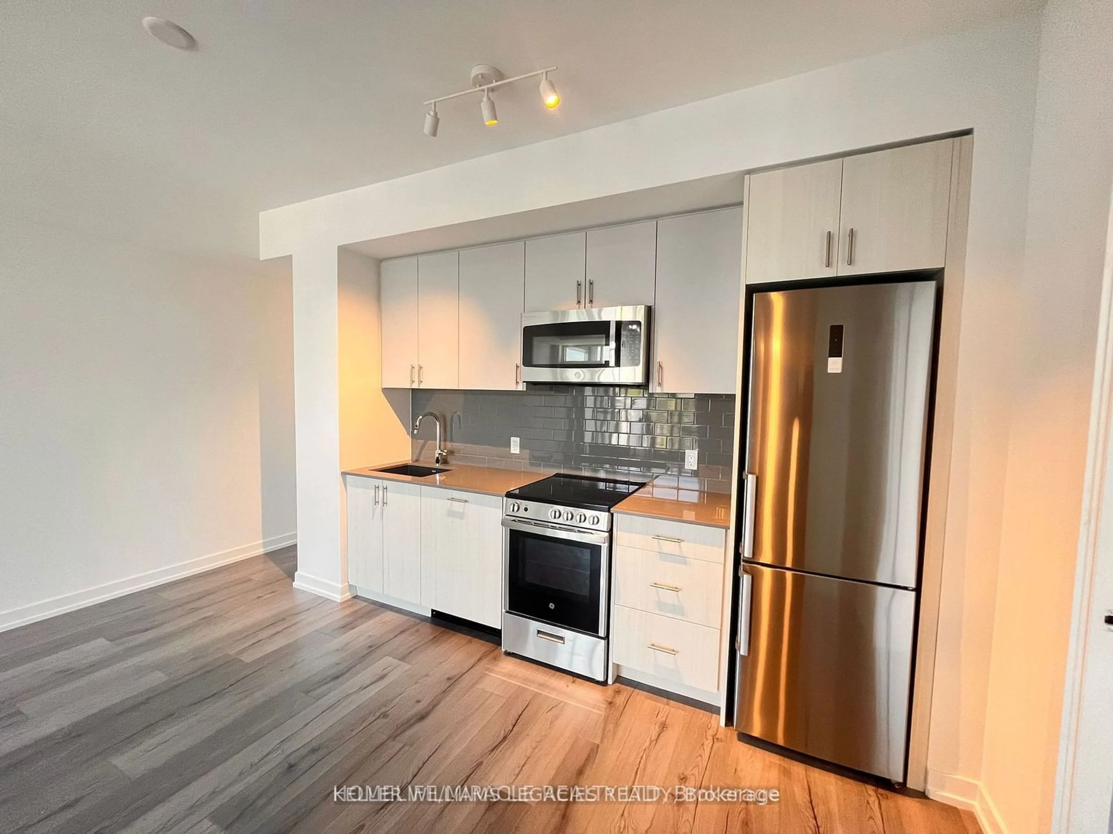 Open concept kitchen for 1195 The Queens Way #303, Toronto Ontario M8Z 0H1